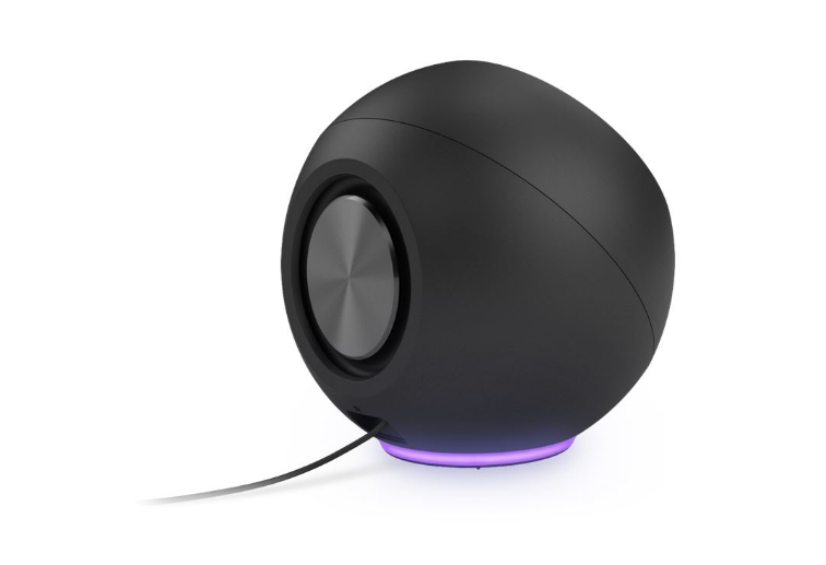 Czarny głośnik sferyczny ze srebrnym środkiem i fioletową podstawą świetlną.