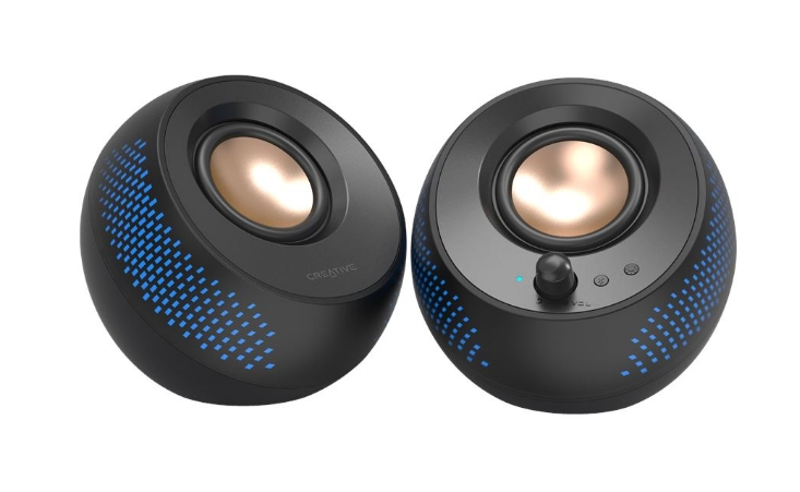 Dwa czarne głośniki z niebieskimi detalami, jeden z regulacją głośności.