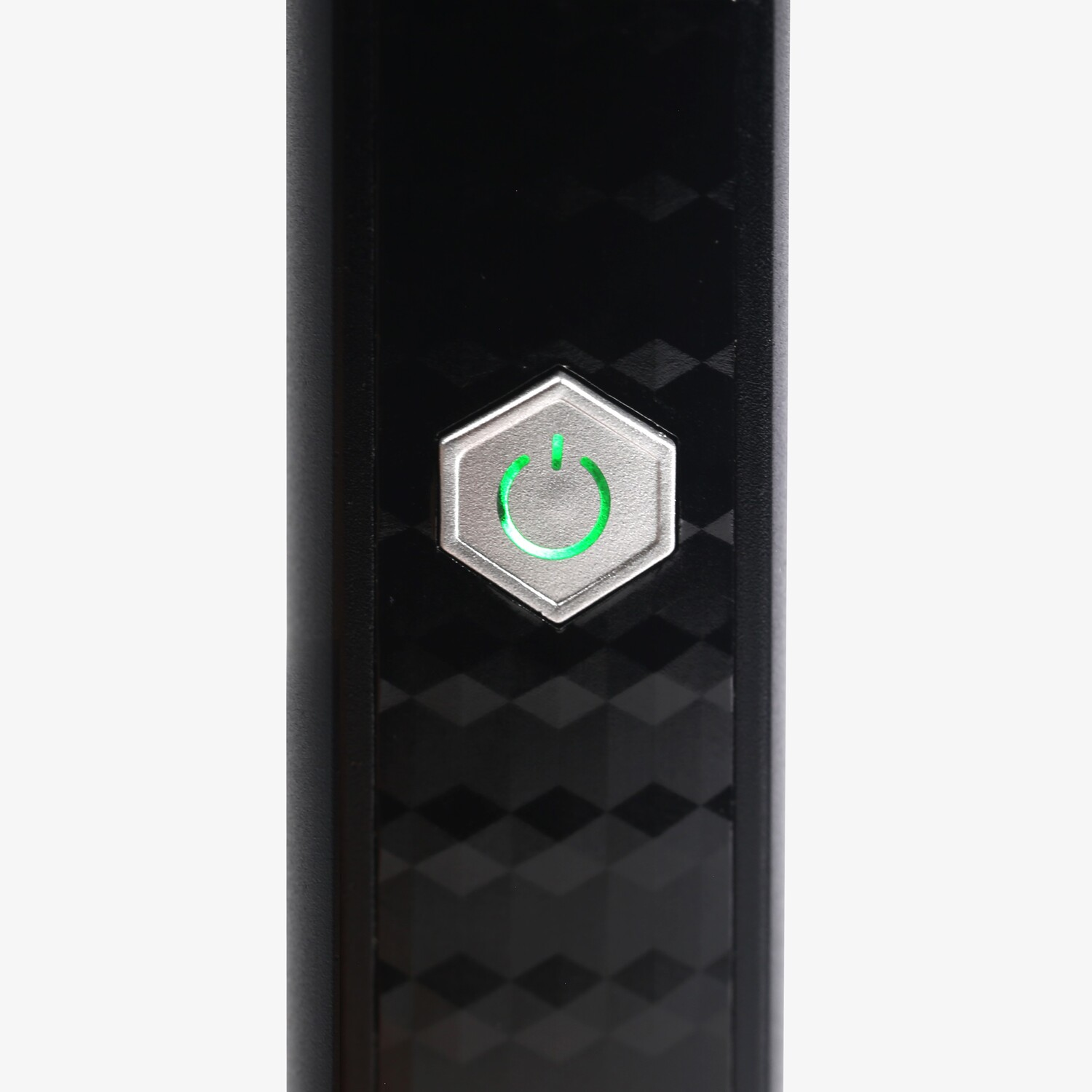 Black device with a power button. The power button is a hexagon and has a green light.