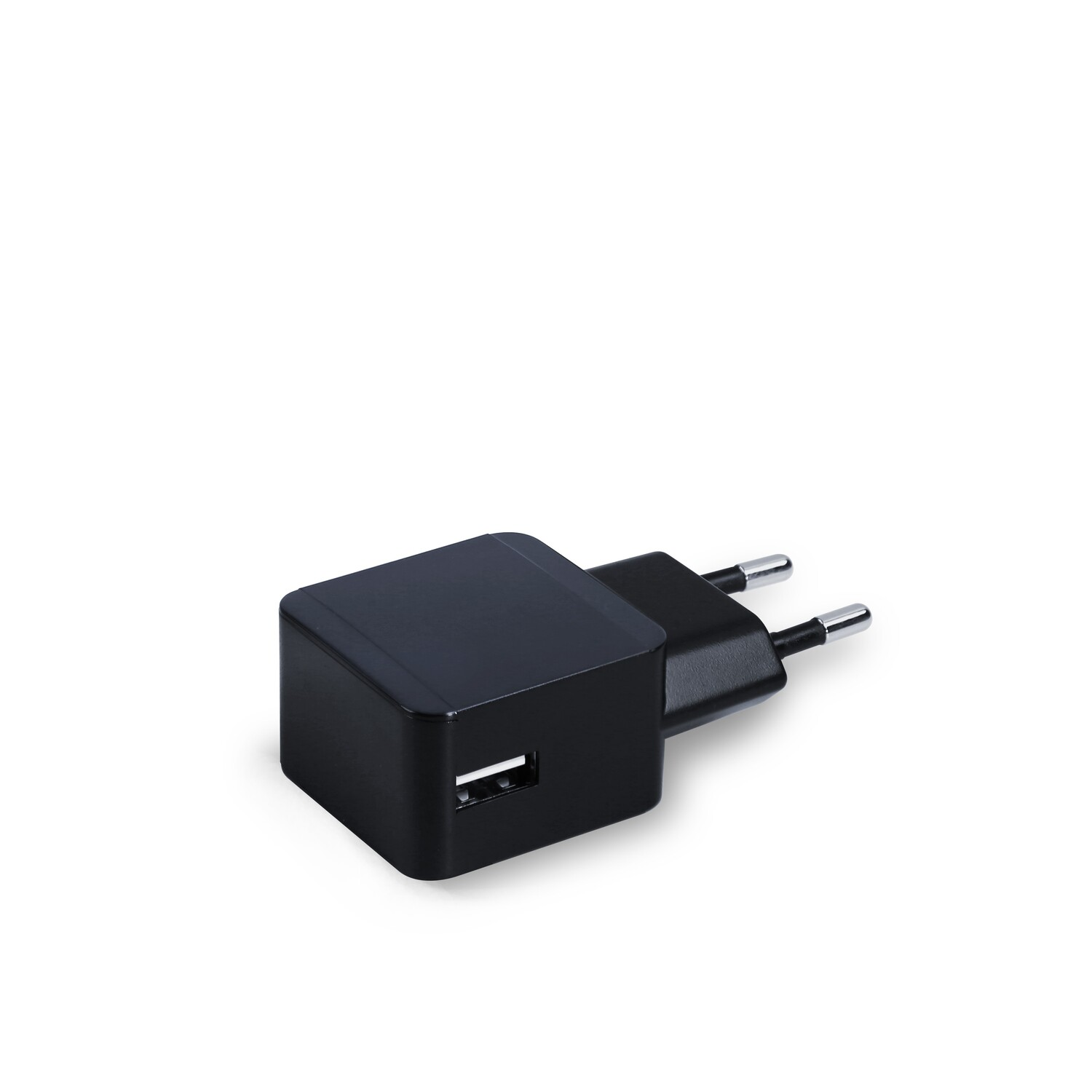 Black USB charger with two prongs. White background.