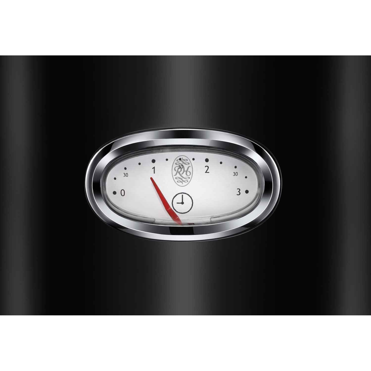 A black appliance with a gauge in the center. The gauge has a red needle and a silver border.