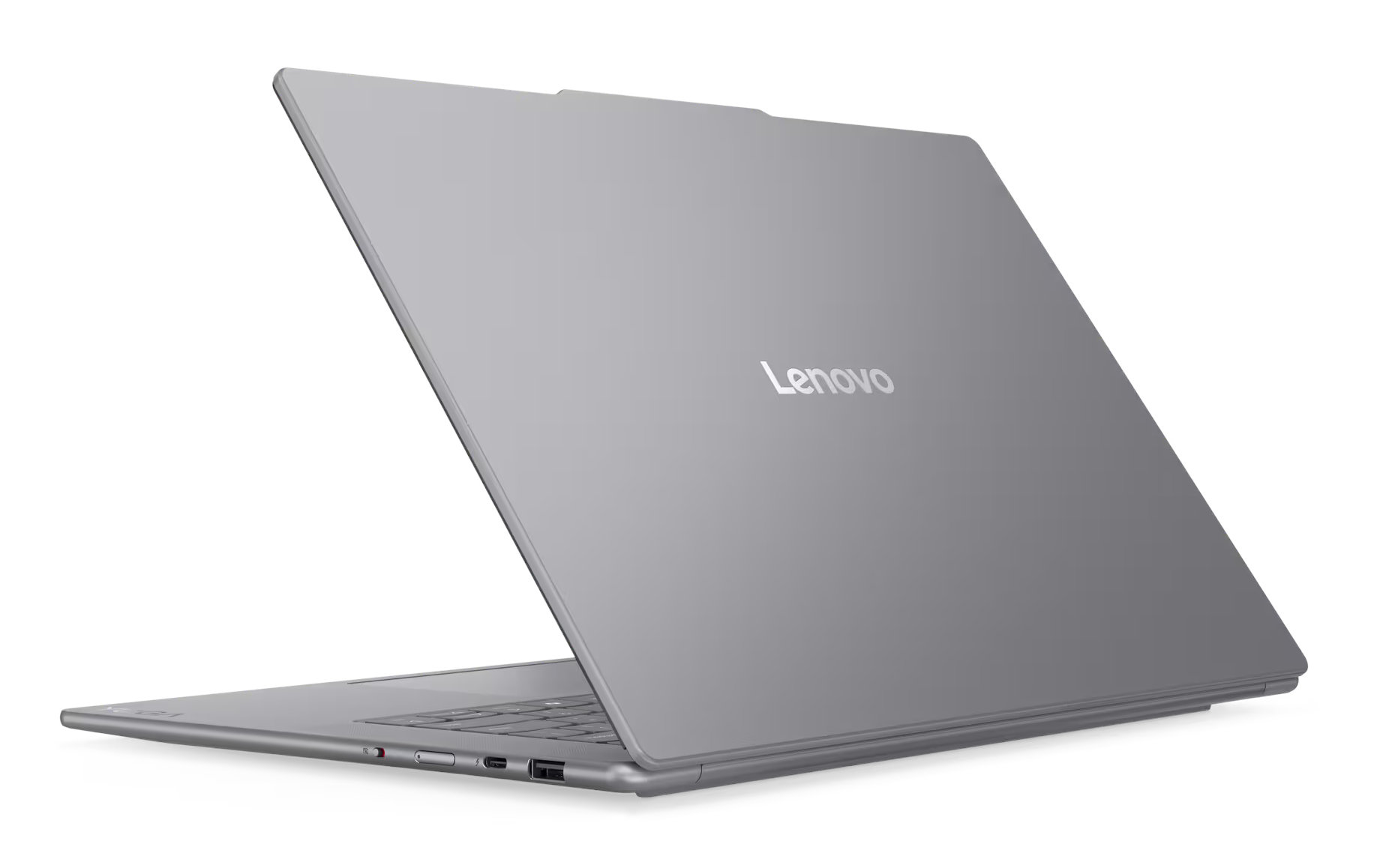 Szary laptop z logo Lenovo, otwarty. Ekran jest skierowany z dala od widza.