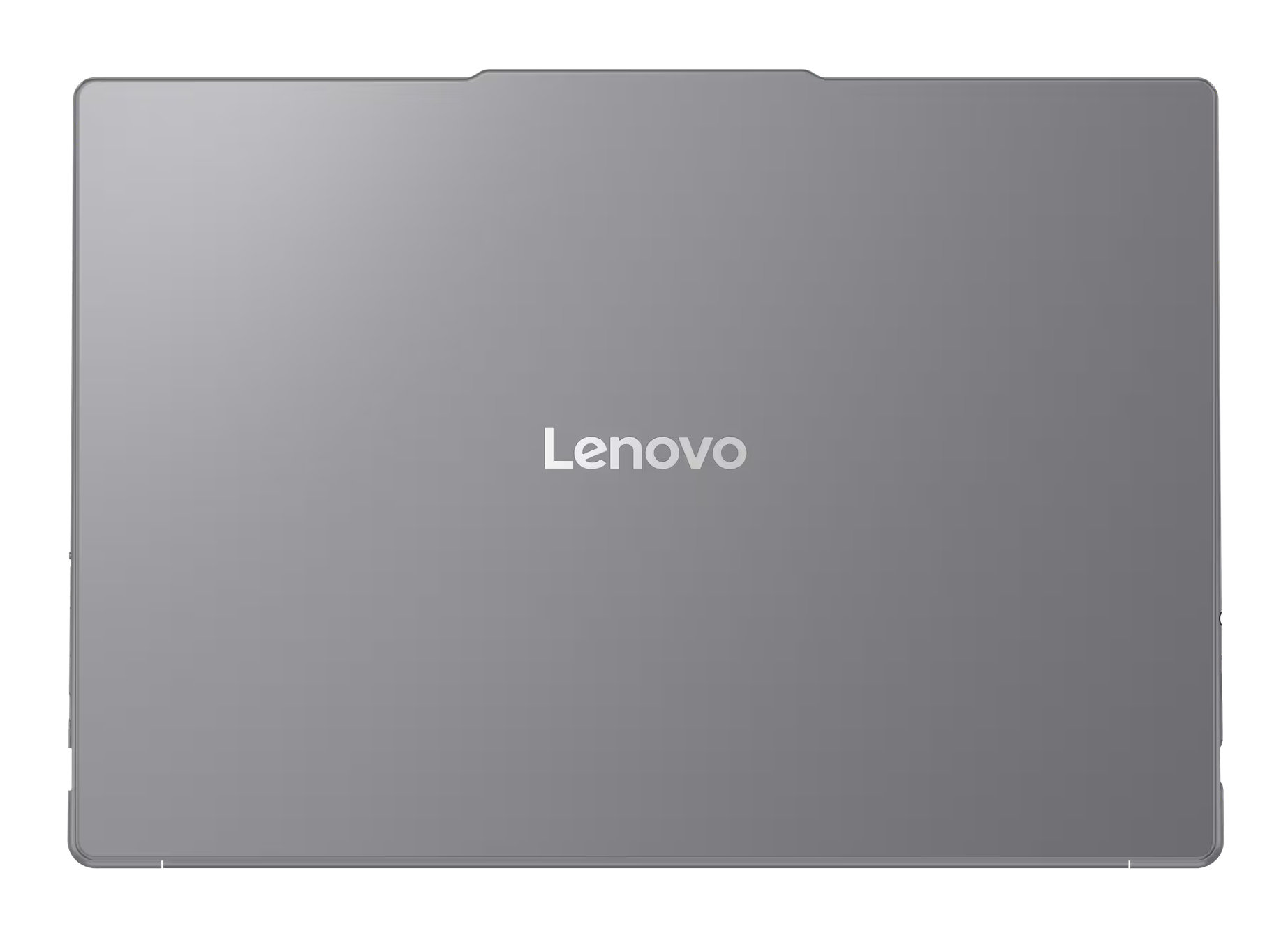 Szary laptop Lenovo, widok z góry. Srebrne logo Lenovo na pokrywie.