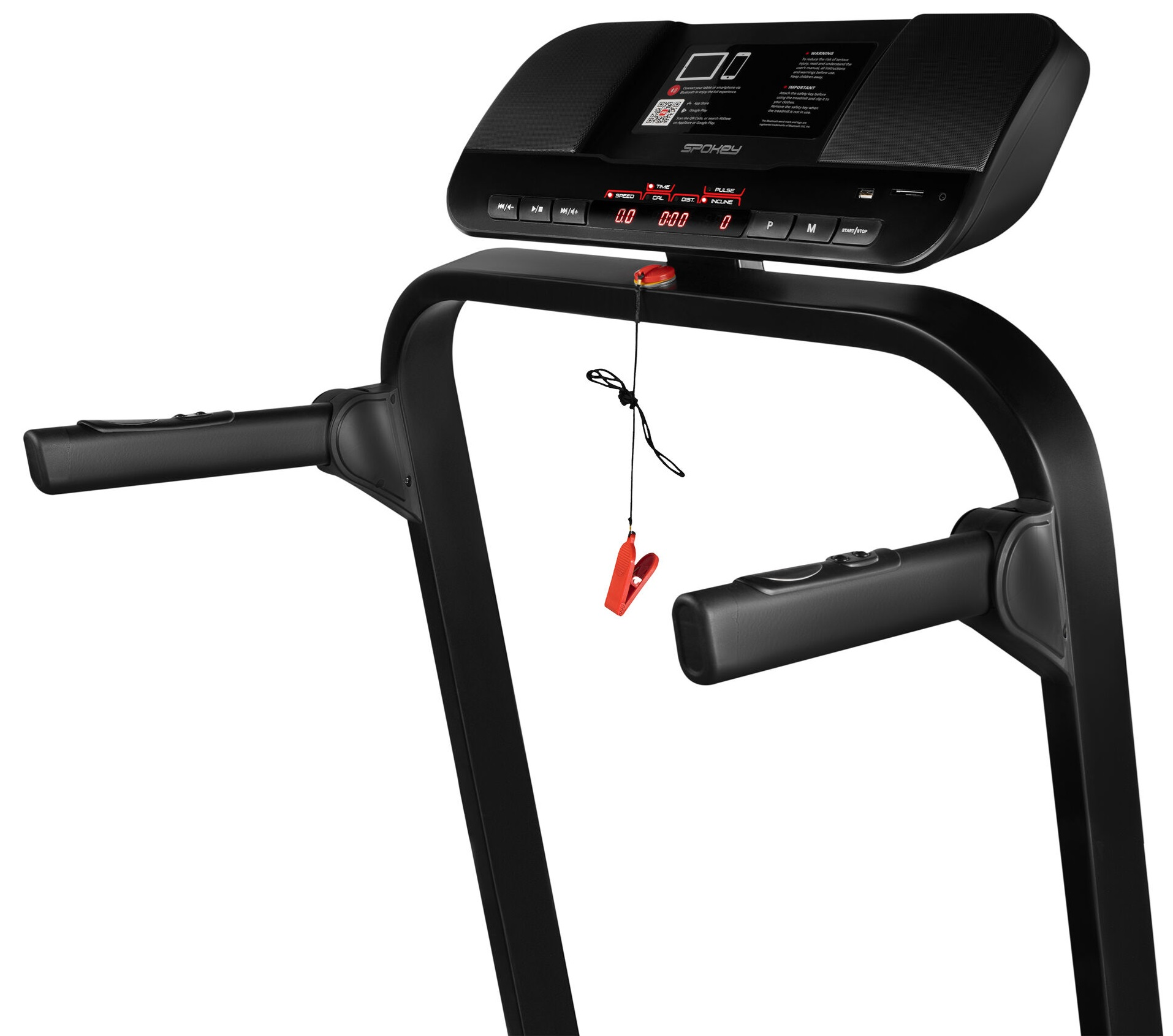 Zbliżenie panelu sterowania bieżni z czerwonym kluczem bezpieczeństwa.