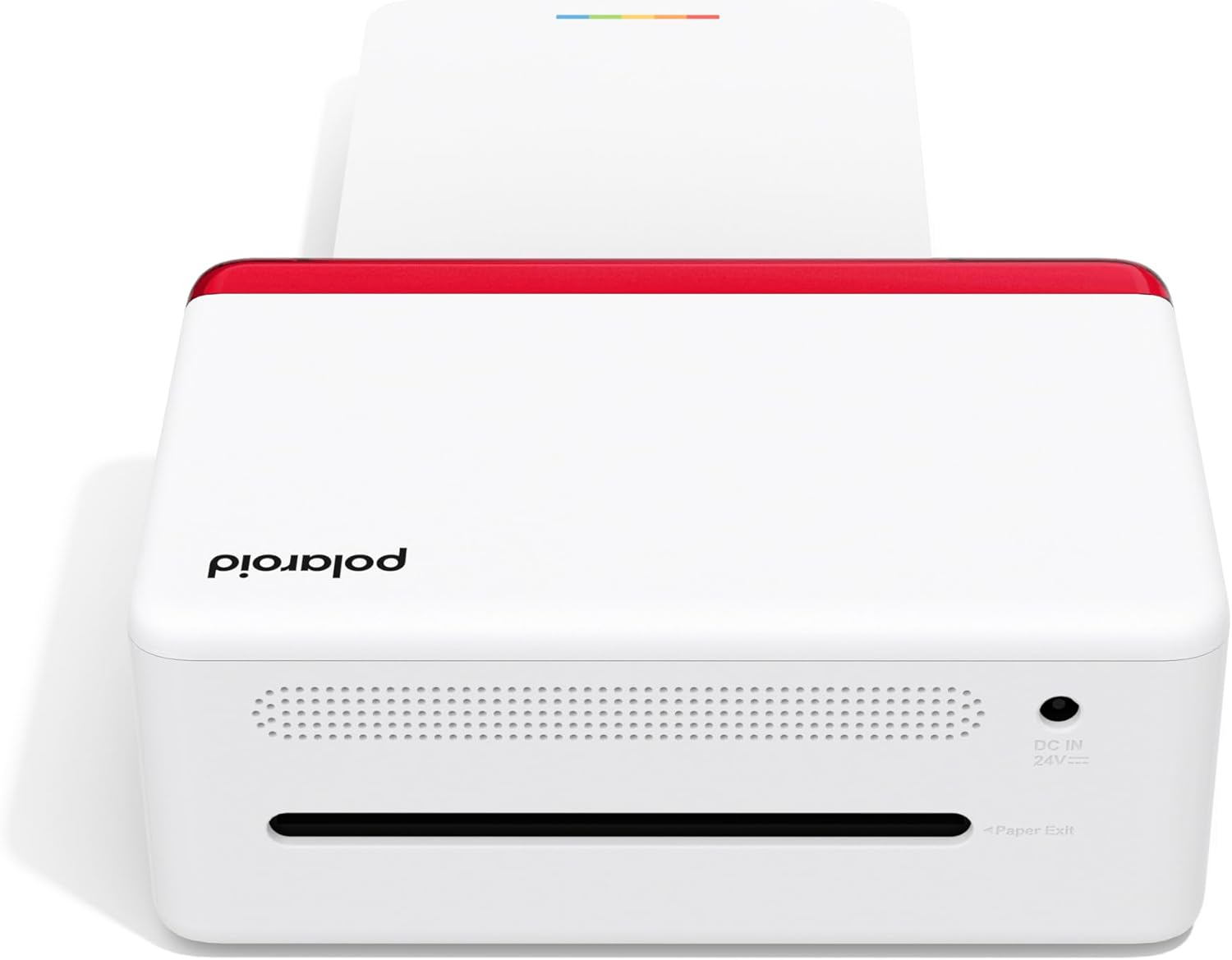 Impresora Polaroid blanca con acento rojo, emitiendo papel. La marca es visible.