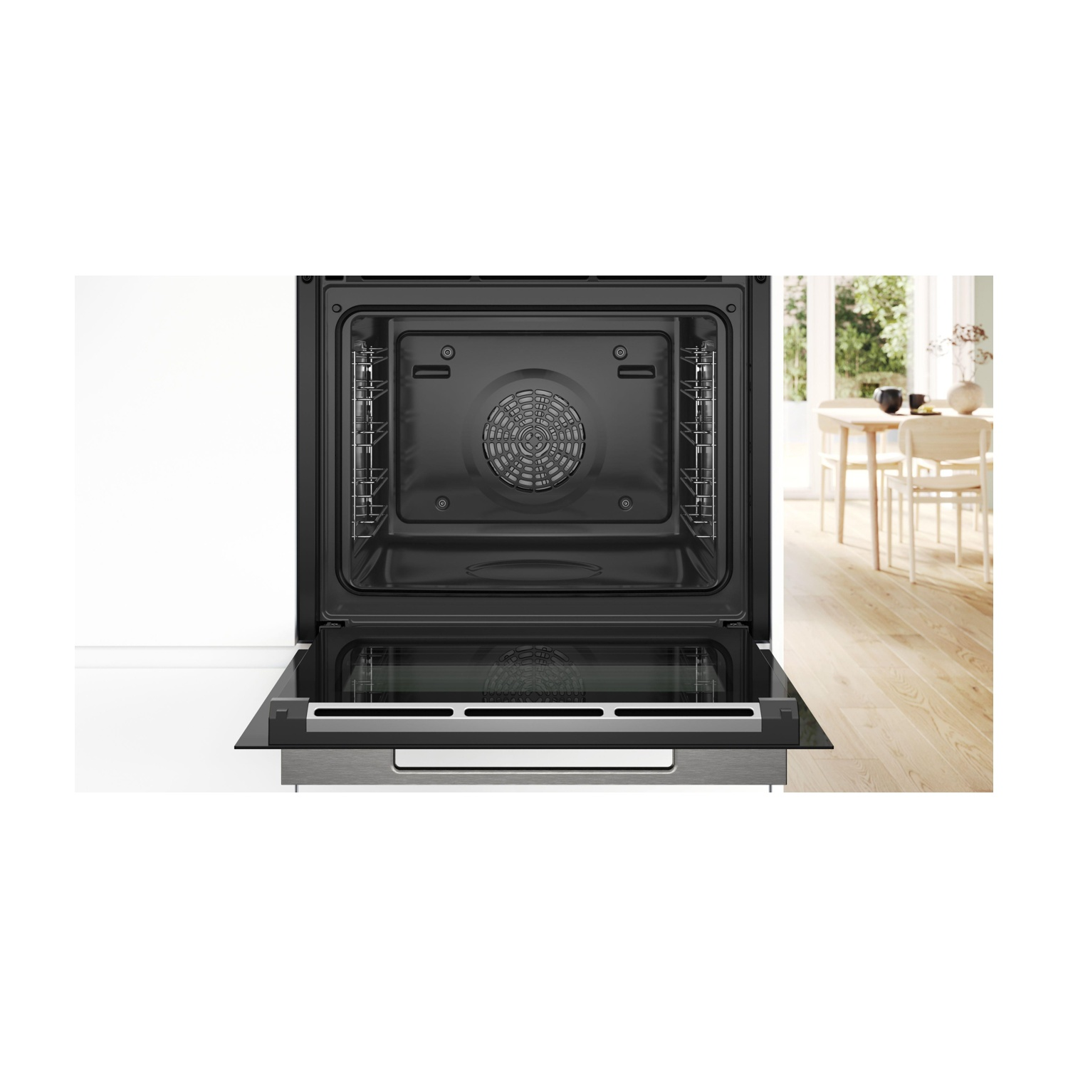 Un forno aperto con la porta abbassata, che mostra l'interno.