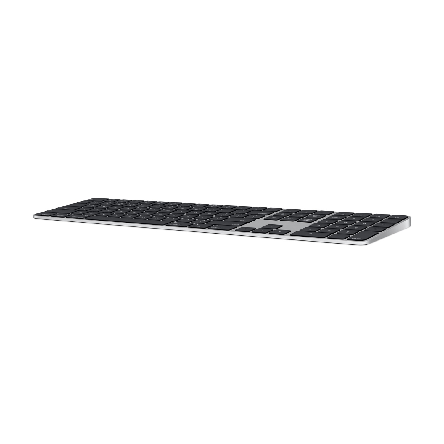 Tastiera Apple nera su sfondo bianco.