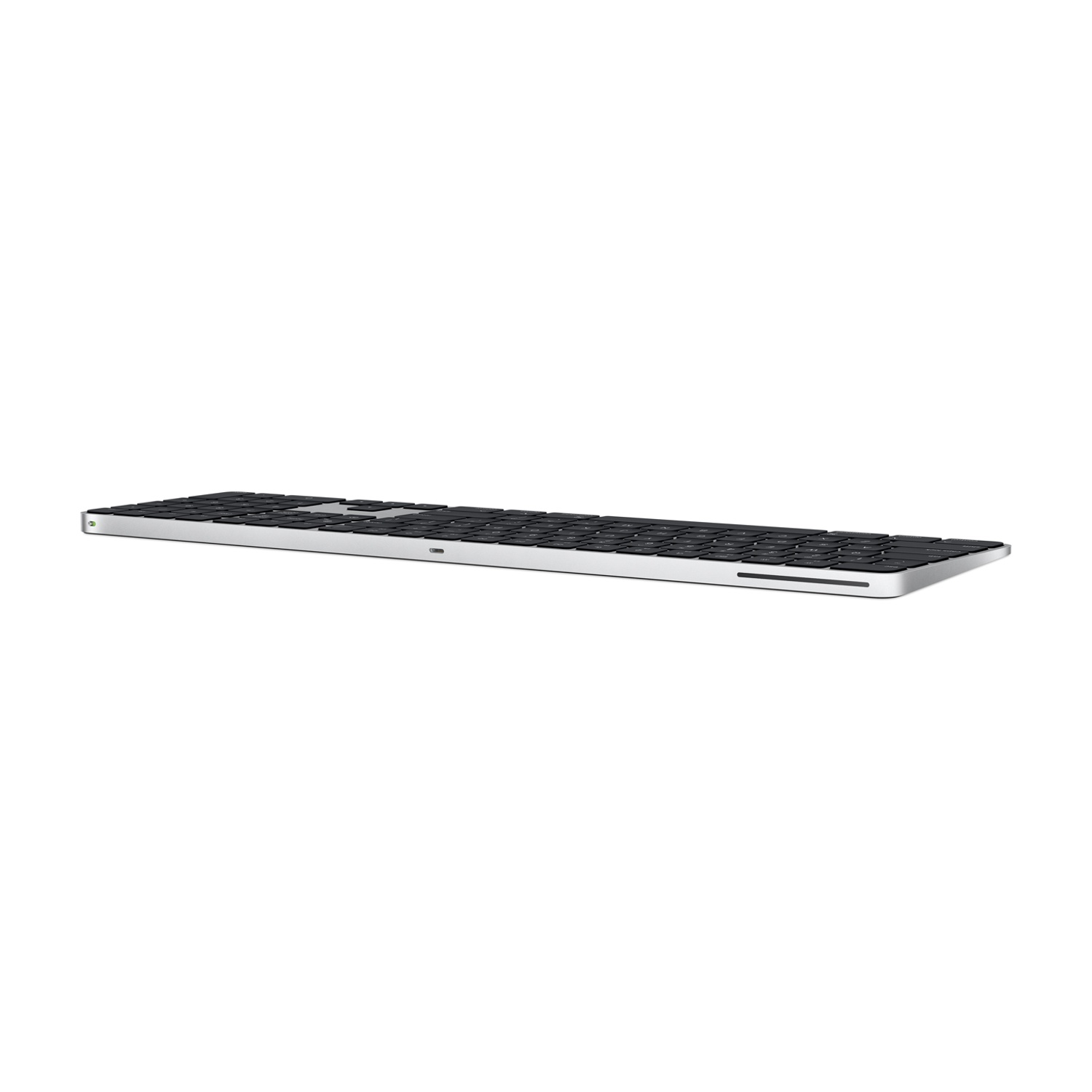 Tastiera Apple nera su sfondo bianco.