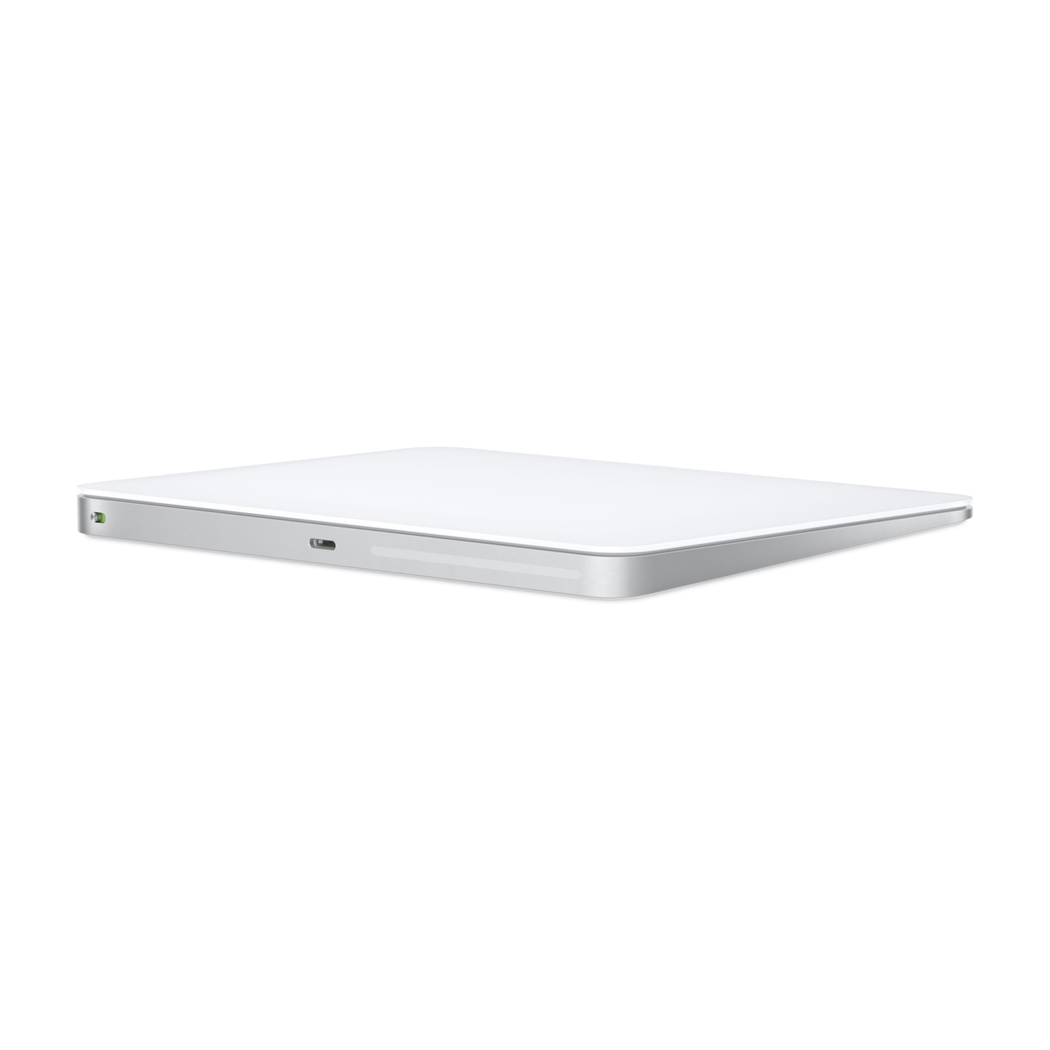 Un Apple Magic Trackpad bianco su sfondo bianco.
