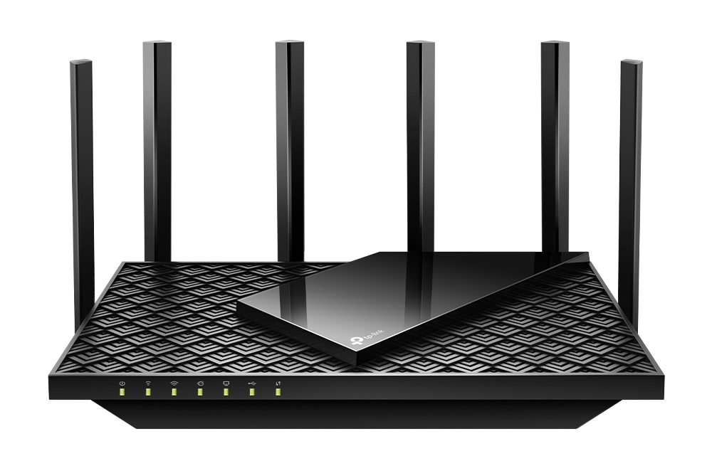 Czarny router TP-Link z sześcioma antenami. Znajduje się na wzorzystej powierzchni i ma kontrolki.