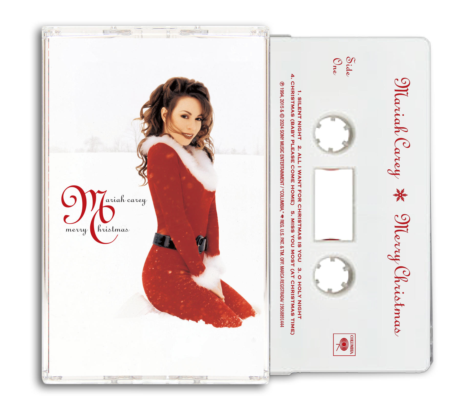 Eine Mariah Carey 'Merry Christmas' Kassette mit dem Albumcover, das Mariah in einem roten Kleid zeigt.