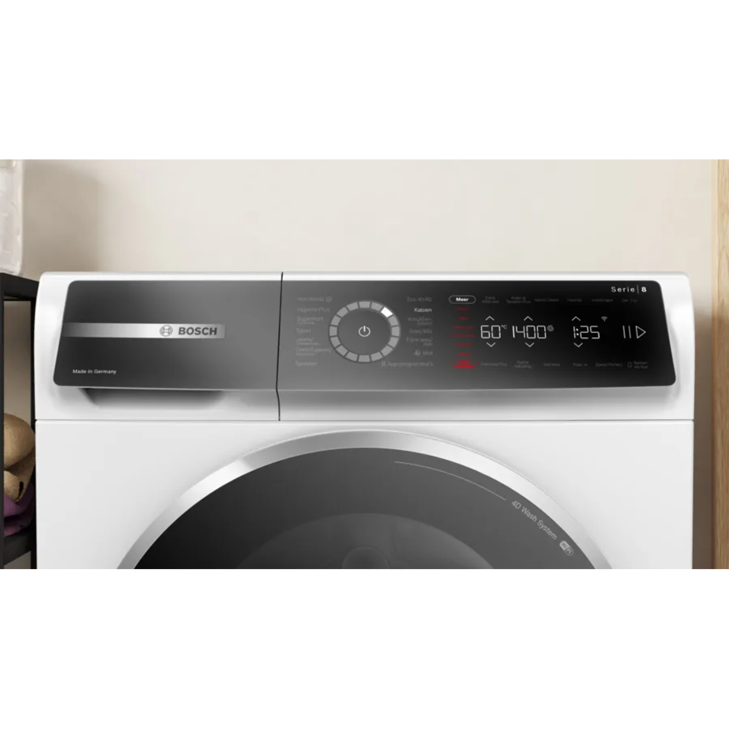 A white Bosch washing machine control panel, with a digital display and buttons.
