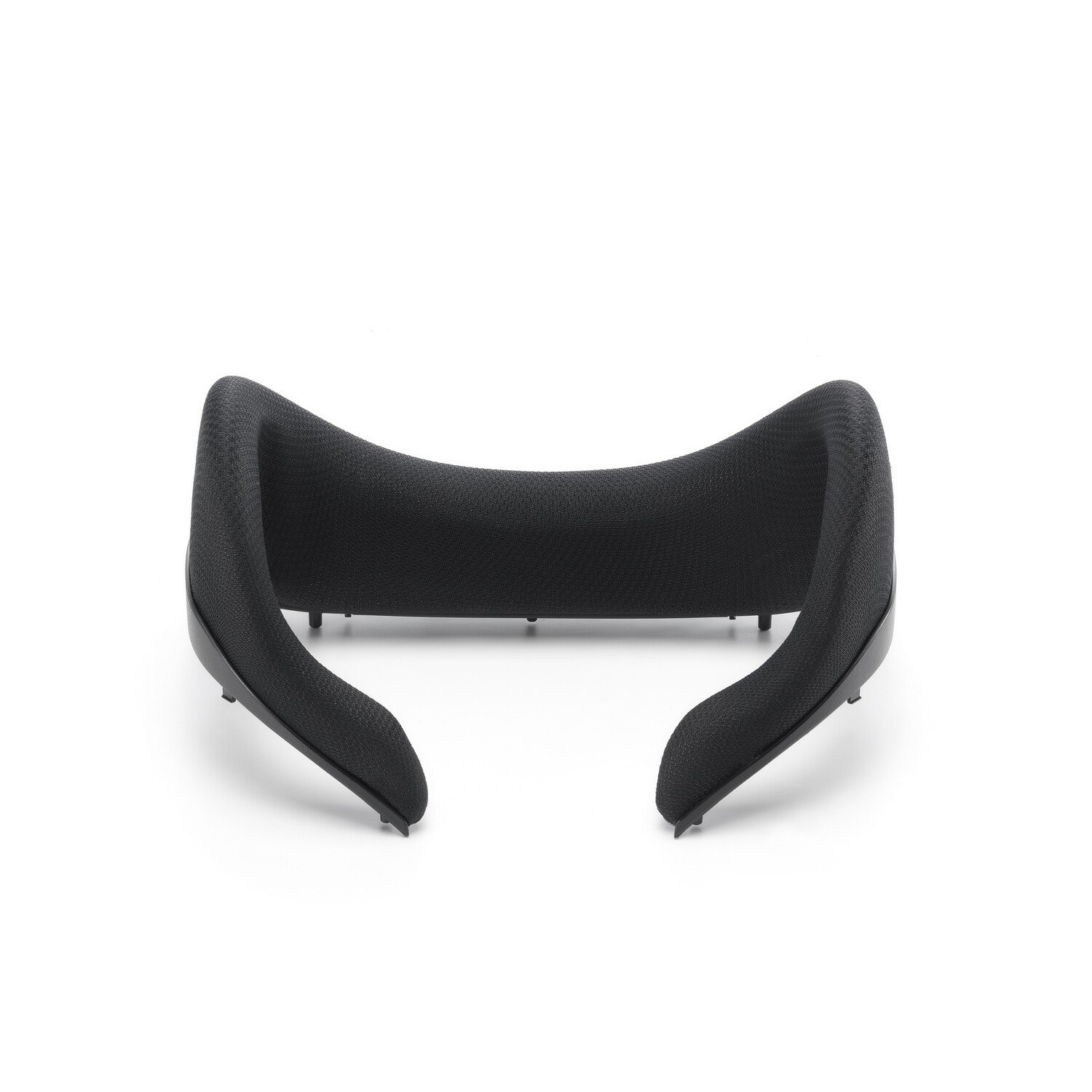 A black, curved VR headset face cushion against a white background.