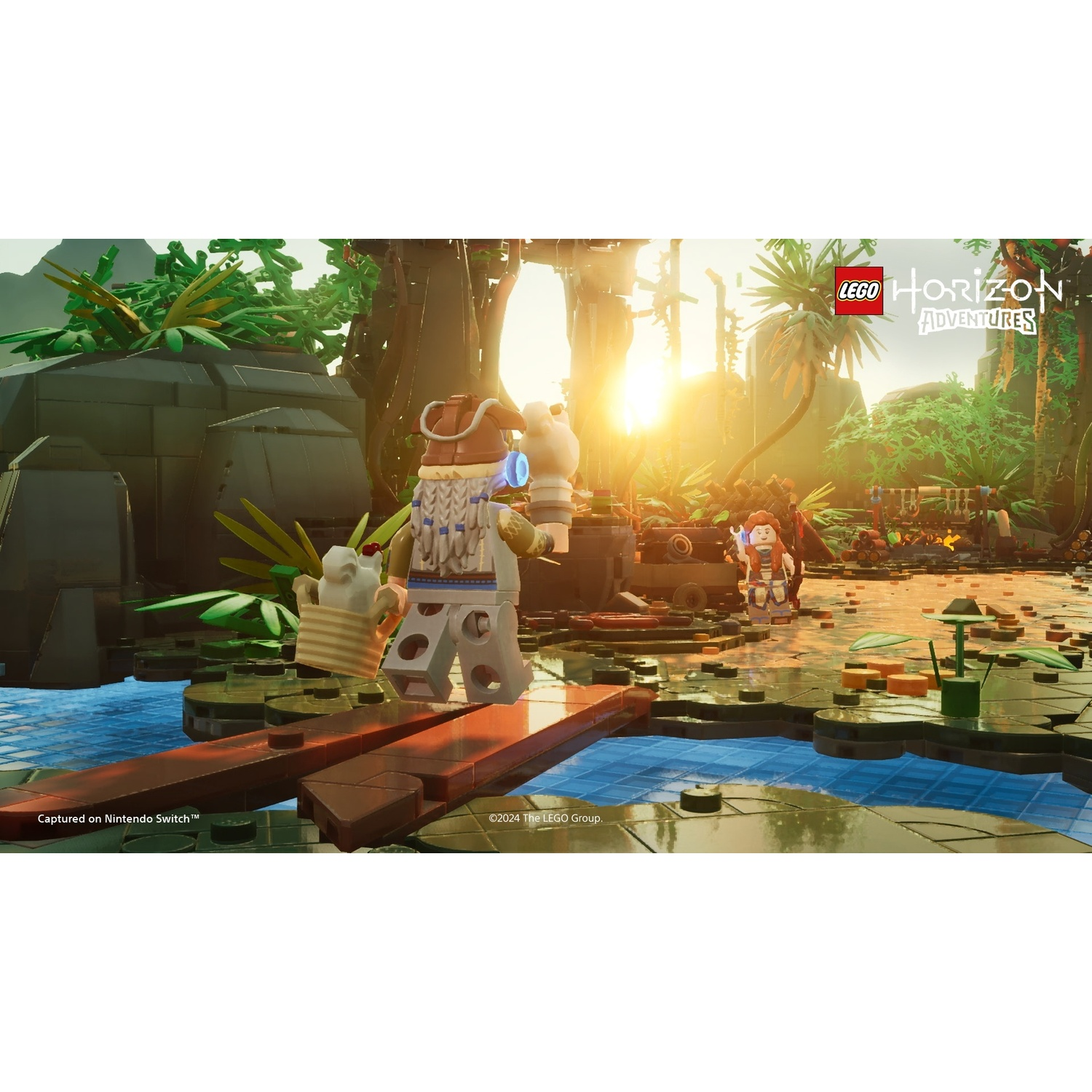 Een LEGO Horizon Adventures-scène. Personages staan op een brug over water in een jungle-omgeving.