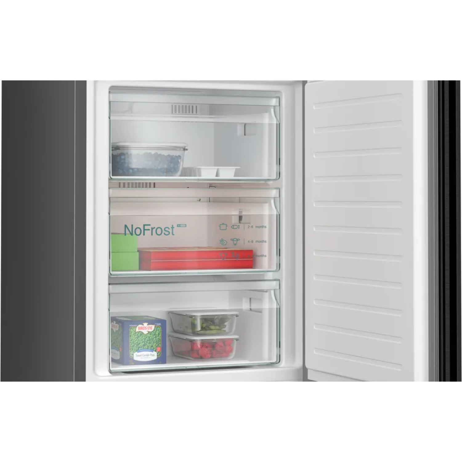 Refrigerator interior with shelves of food, including frozen peas and containers.