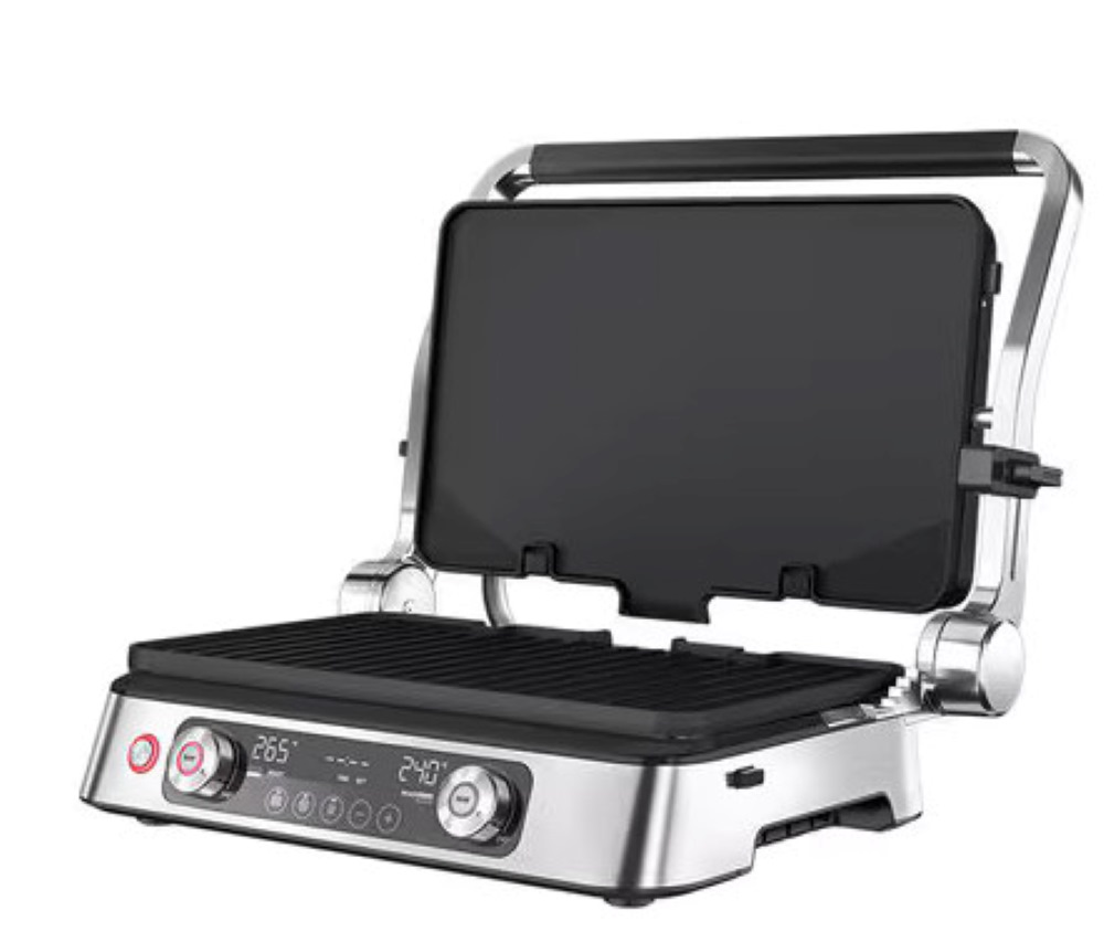 Srebrna prasa do panini z otwartą pokrywą, pokazująca powierzchnię do grillowania i panel sterowania.
