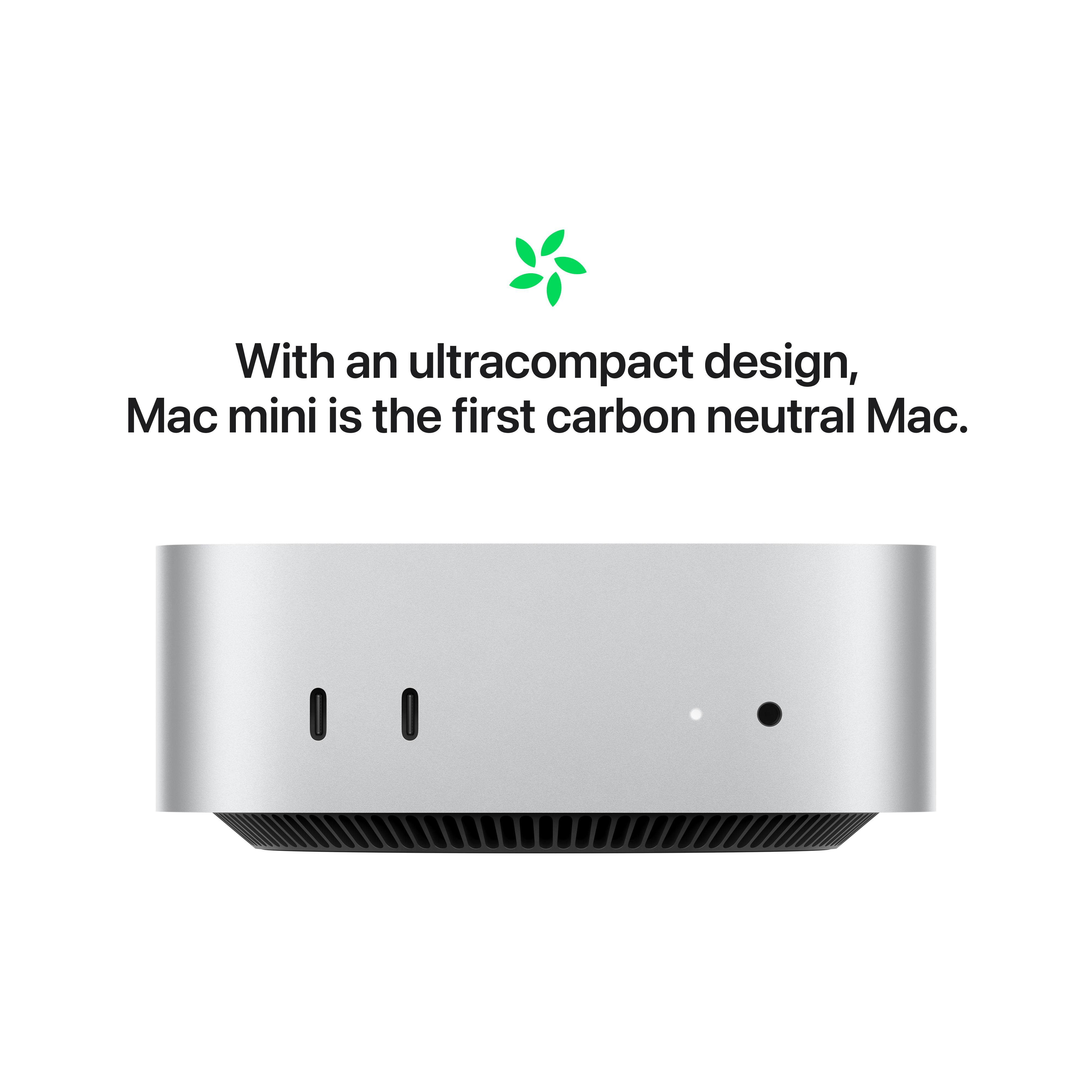 Computer Mac Mini argento su sfondo bianco con testo e un'icona a forma di foglia verde.