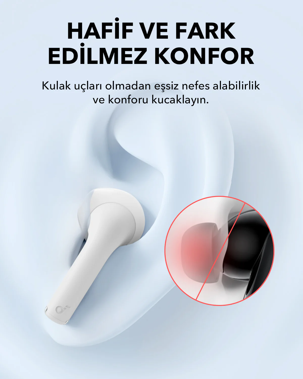 Kayalık bir kıyıda dizüstü bilgisayar ve kamera ekipmanlarıyla iki kişi. Karlı bir arka plan.