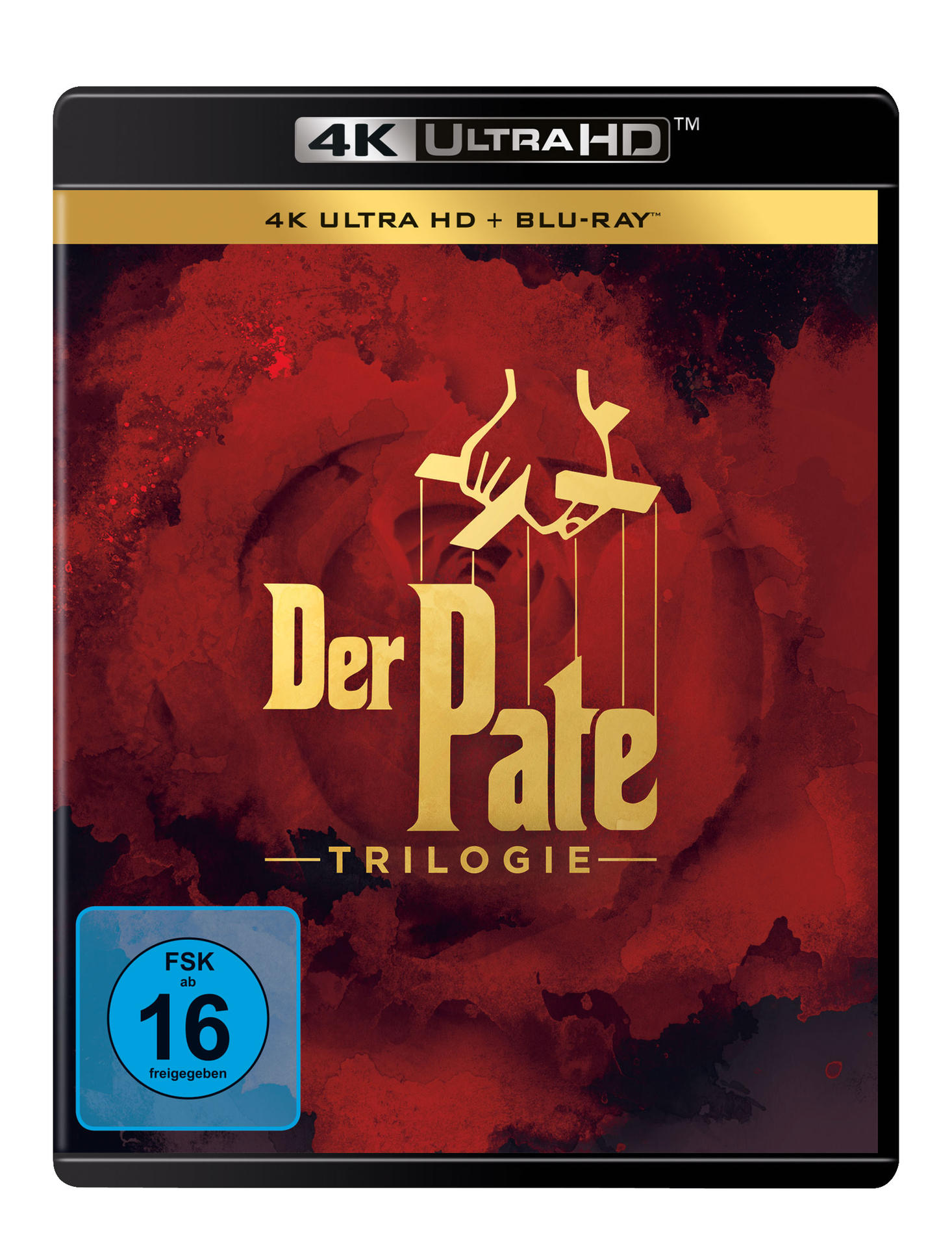 Filmcover: 'Der Pate' Blu-ray. Roter Hintergrund mit Rose und Hand mit Fäden.