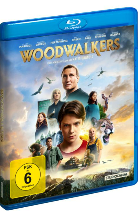 Blu-ray-Disc-Cover des Films Woodwalkers mit einem Waldhintergrund.