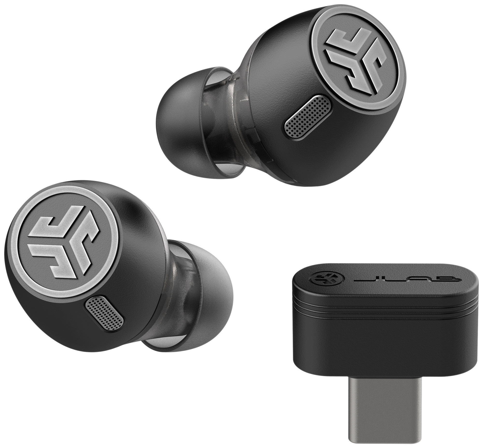 Fekete vezeték nélküli fülhallgató és USB-C adapter, közeli felvétel.