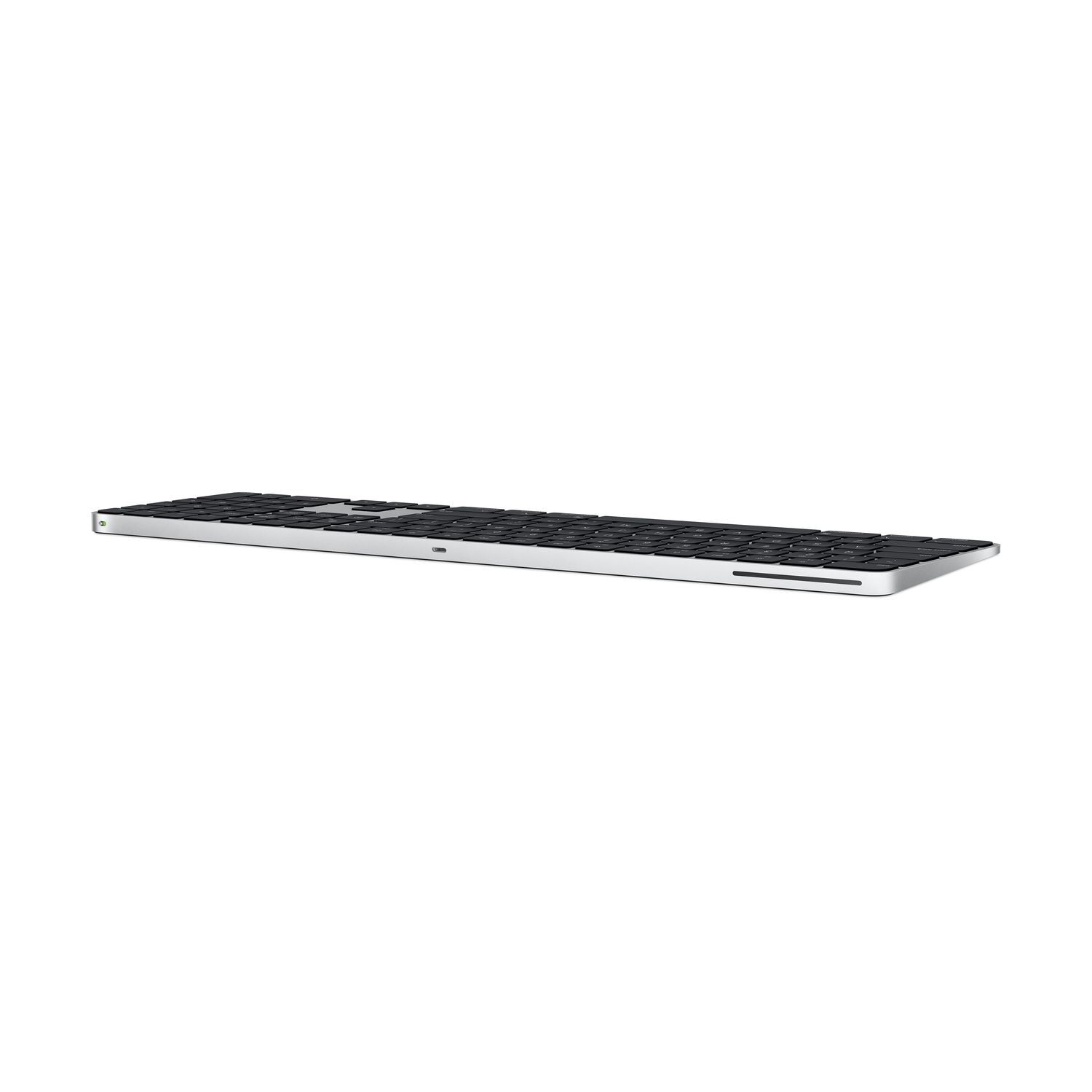 Un Apple Magic Keyboard argent et noir, vu de côté.