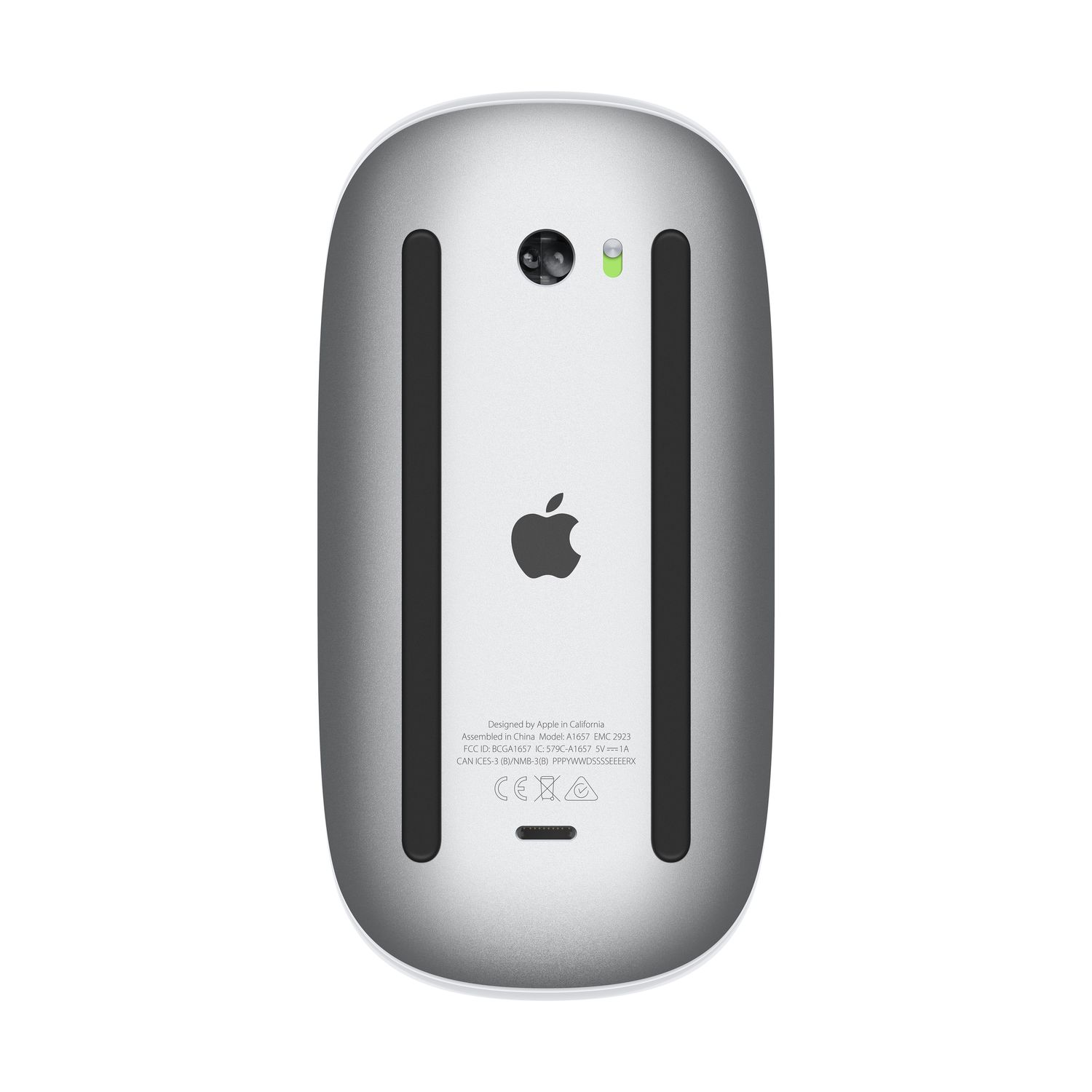 Apple Magic Mouse, bottom view. Silver with black Apple logo. Designed in California.