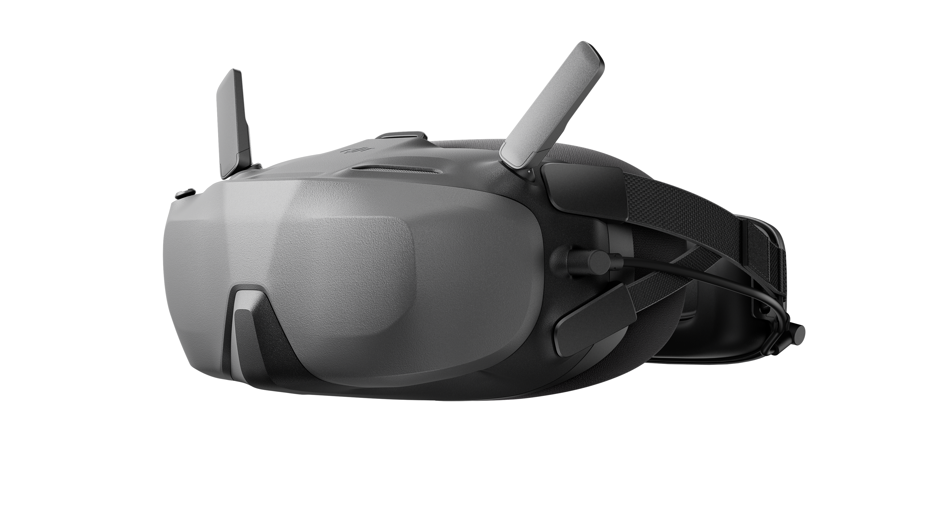 VR-Headset in Grau. Das Headset hat zwei Antennen und ein Band. Es befindet sich auf weißem Hintergrund.