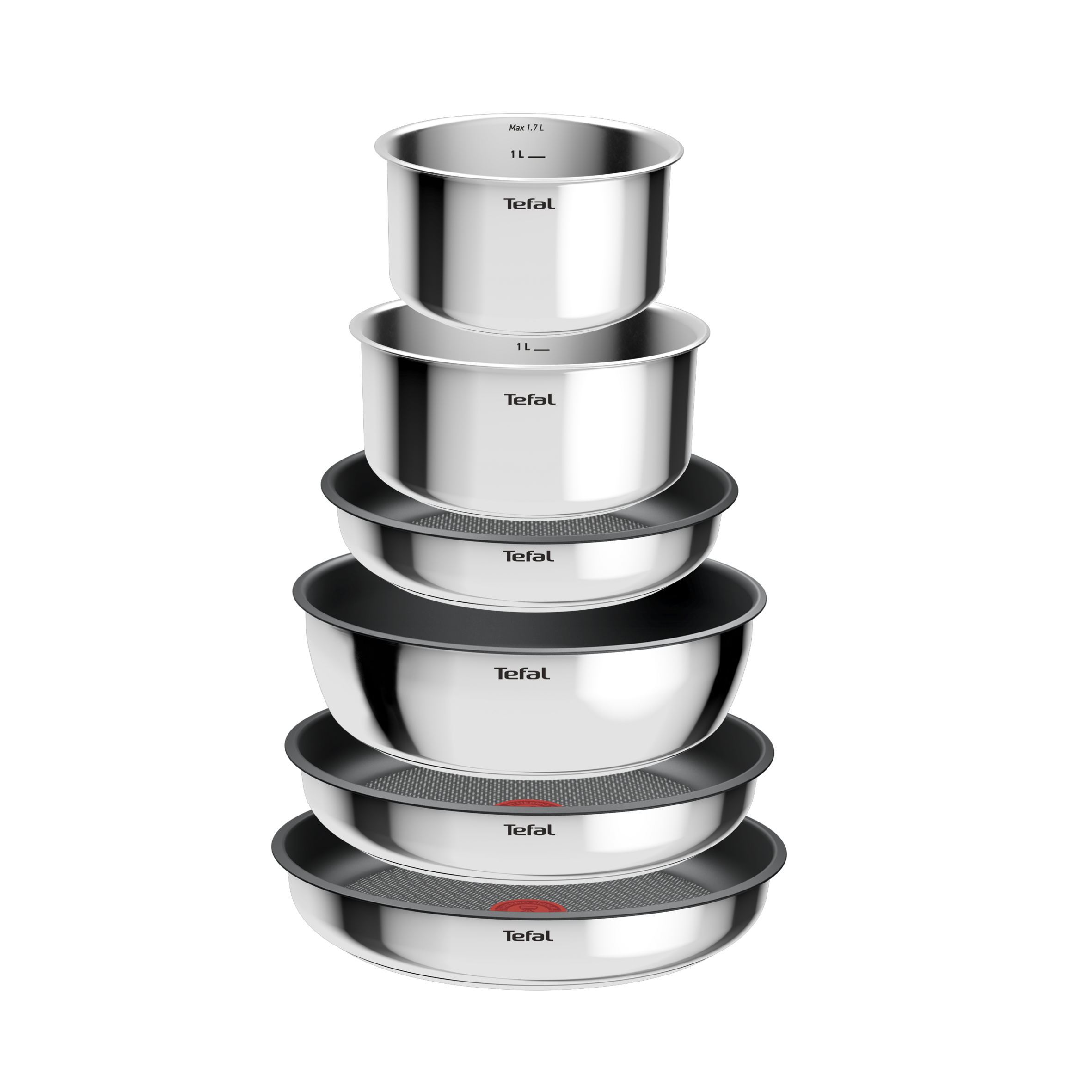 Stos garnków kuchennych ze stali nierdzewnej. Ułożone są w kolejności malejącej.