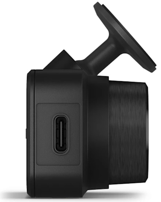 Widok z boku czarnej kamery samochodowej z obiektywem i mocowaniem.