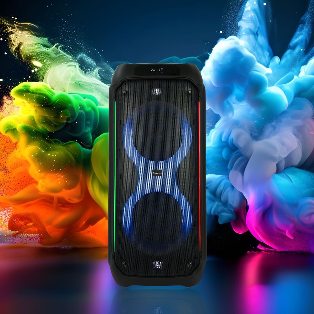 Duży czarny głośnik z kolorowym dymem w tle.