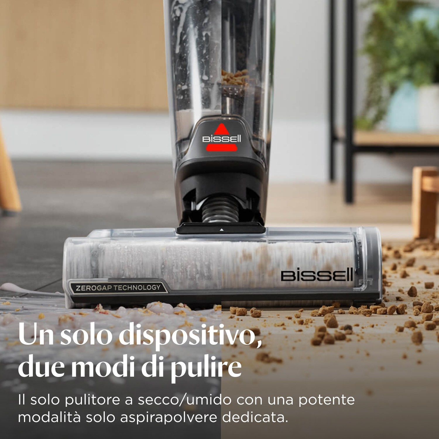 Aspirapolvere Bissell con testina di pulizia sul pavimento. Testo: 'Tecnologia Zerogap'.