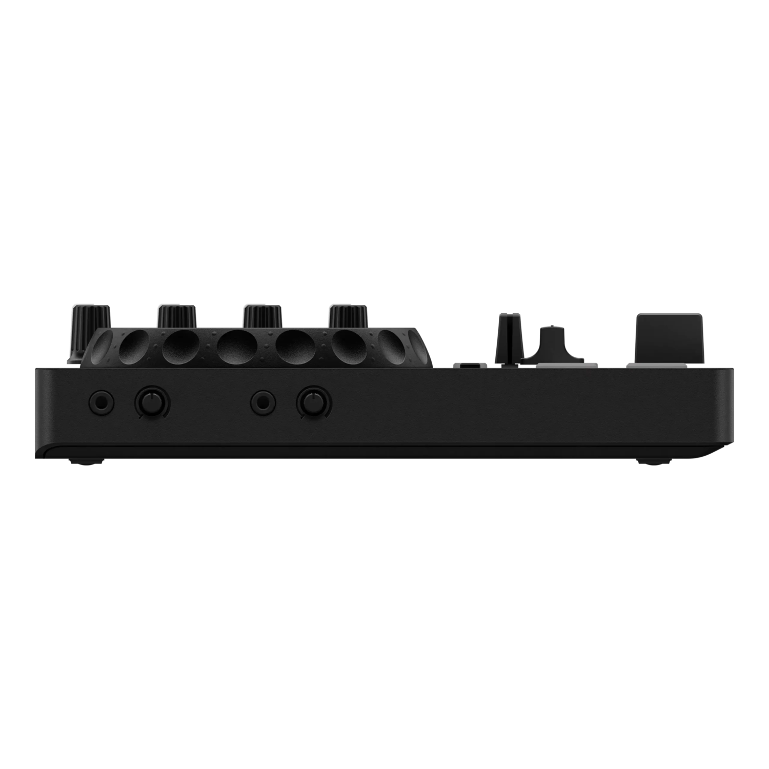 Black audio mixer, with knobs and connection ports. Black background.
