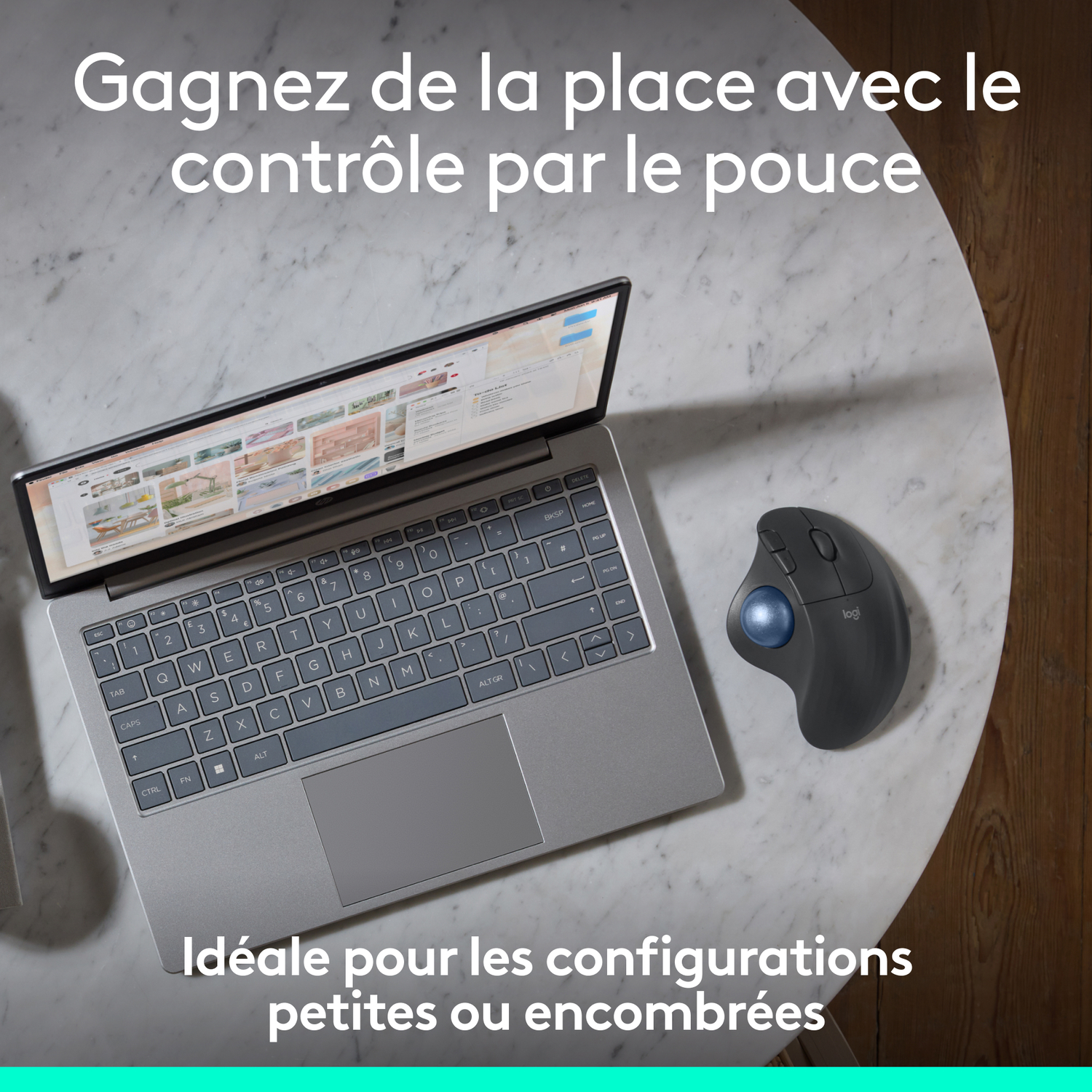 Ordinateur portable et souris sur une table ronde. Texte au-dessus et en dessous.