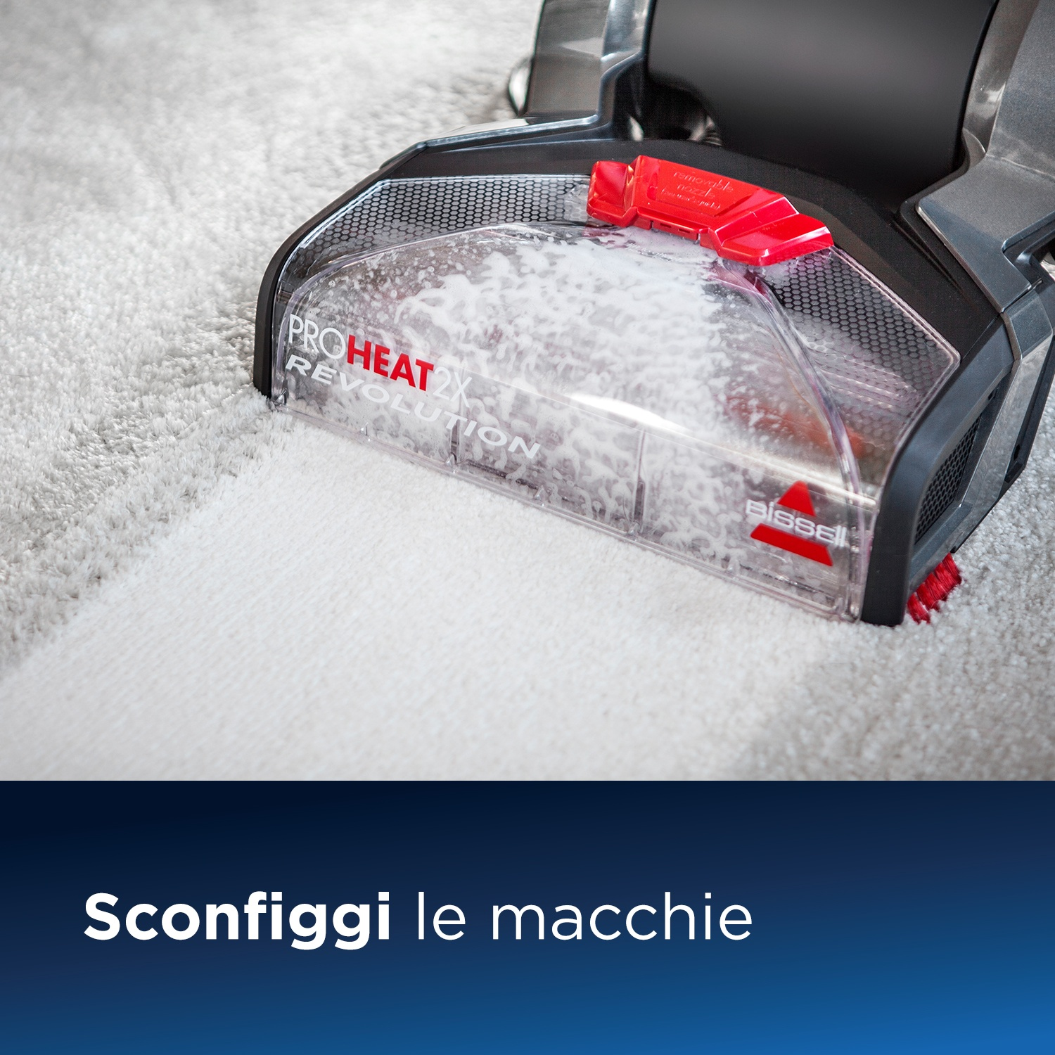 Aspirapolvere che pulisce un tappeto. Scritta 'ProHeat Revolution'.