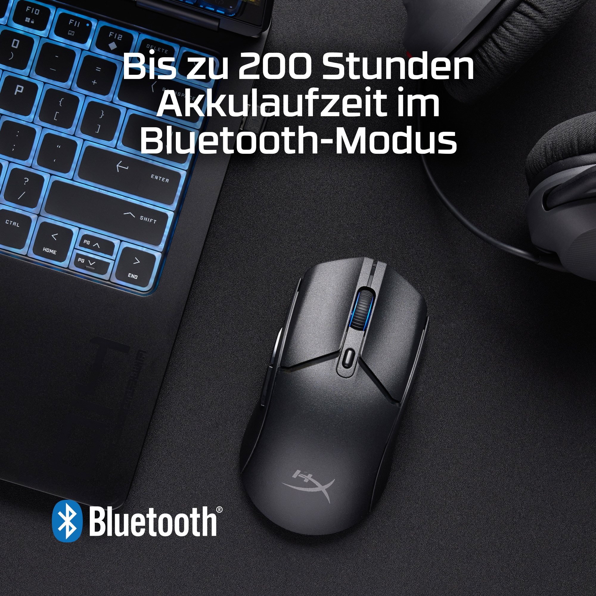 Eine schwarze Maus mit blauem Scrollrad. Die Tastatur ist beleuchtet. Bluetooth-Logo ist sichtbar.