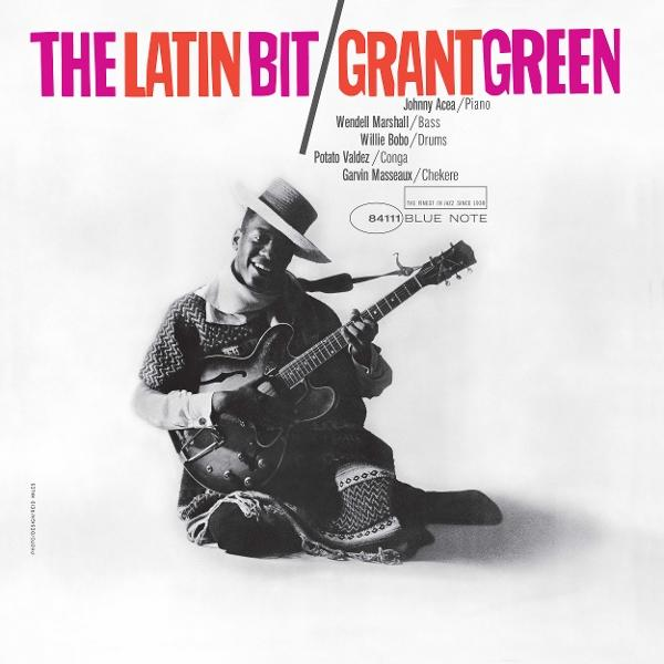 Pochette d'album : un homme avec un chapeau joue de la guitare. Texte en haut.