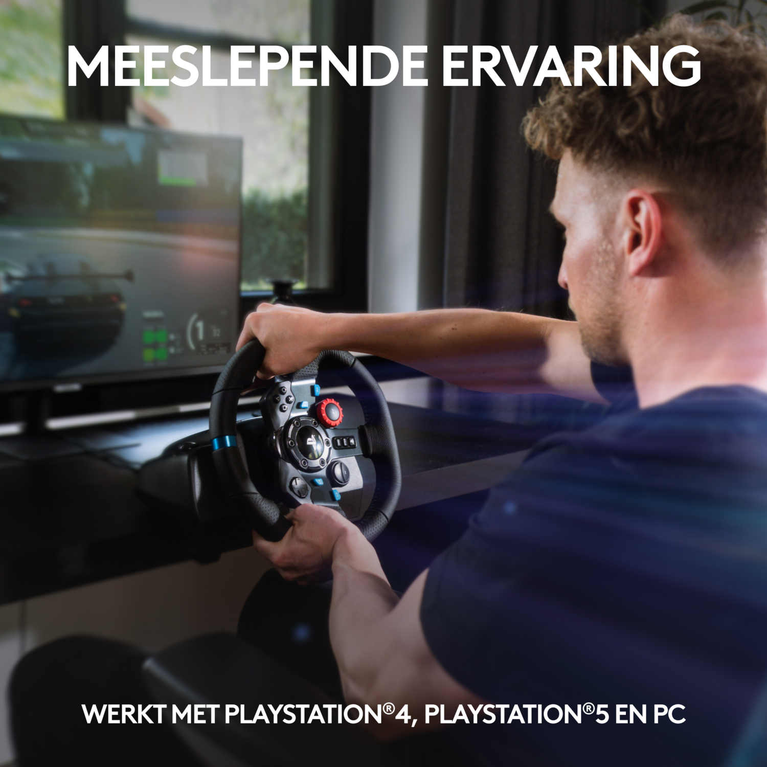 Man playing a racing game on a TV screen, holding a steering wheel.
