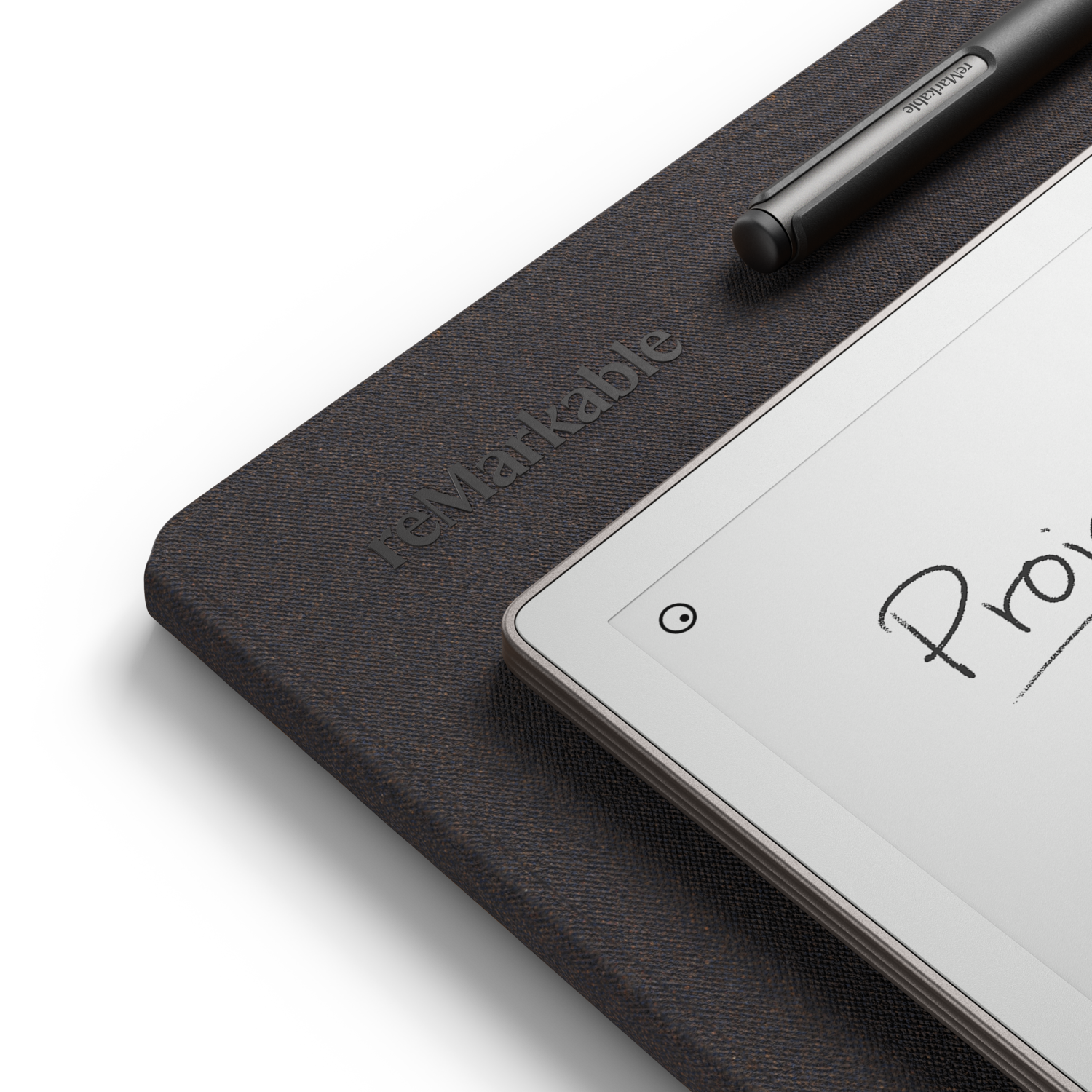 Remarkable tablet met pen op een getextureerd donkerbruin oppervlak.