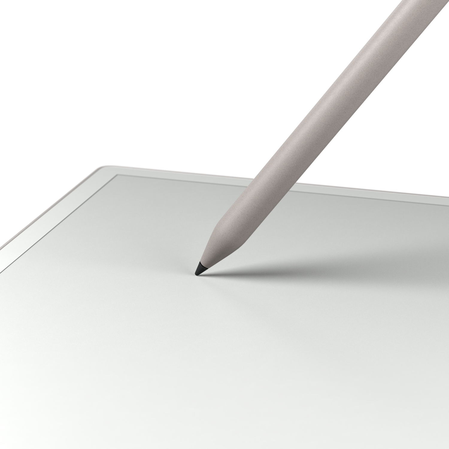 Stylus pen on a white surface, black background.