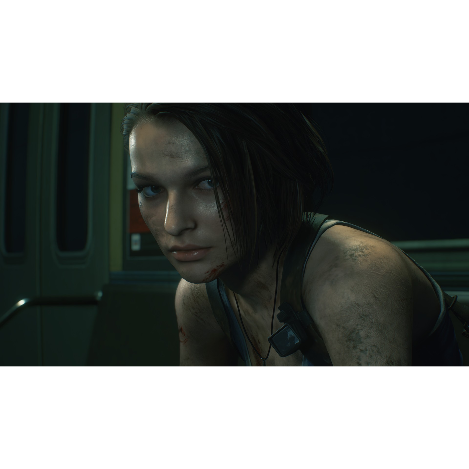 Close-up of a woman's face in a dimly lit room. She has blood on her face and a worried expression.