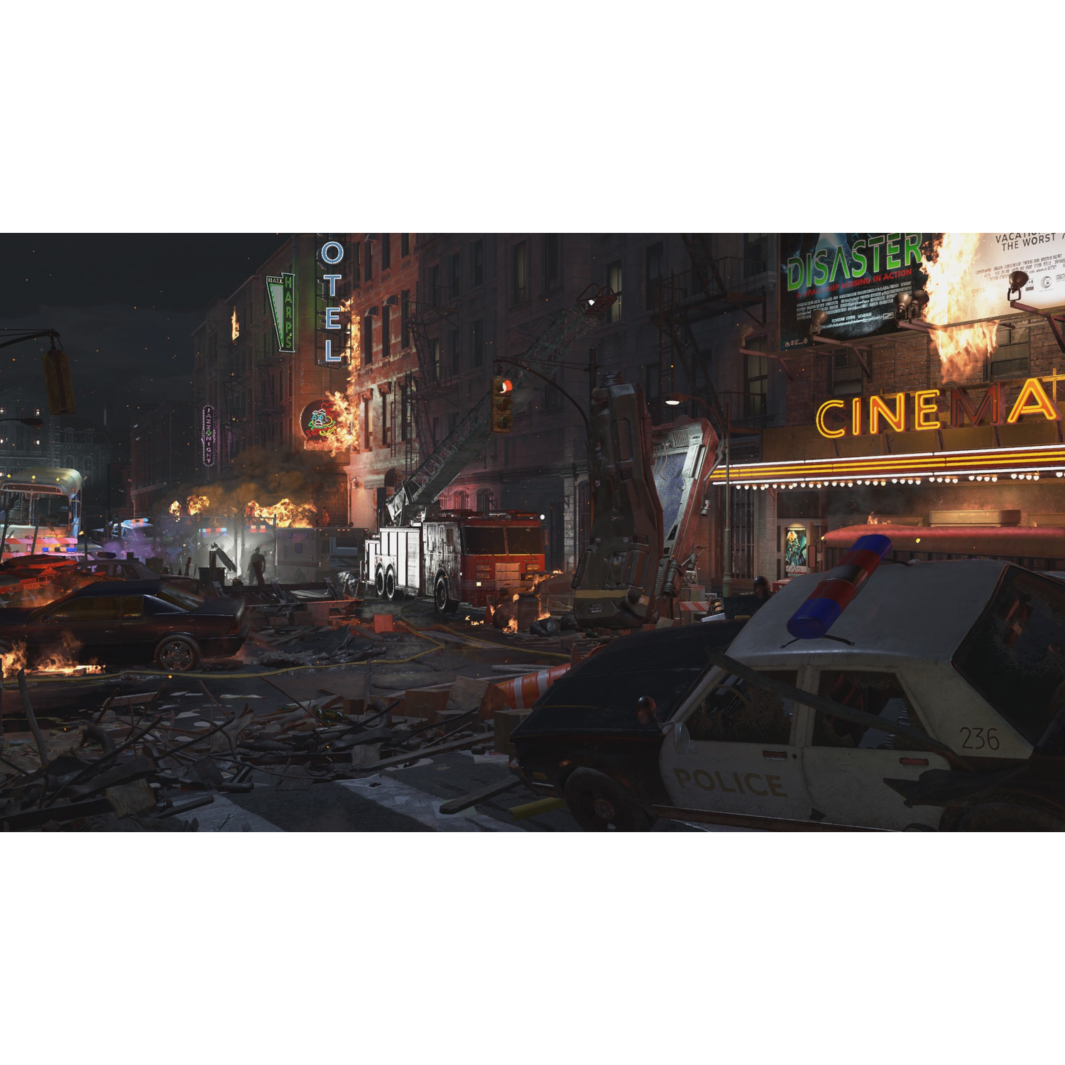 A city street at night, with burning buildings, a fire truck, police car, and cinema sign.