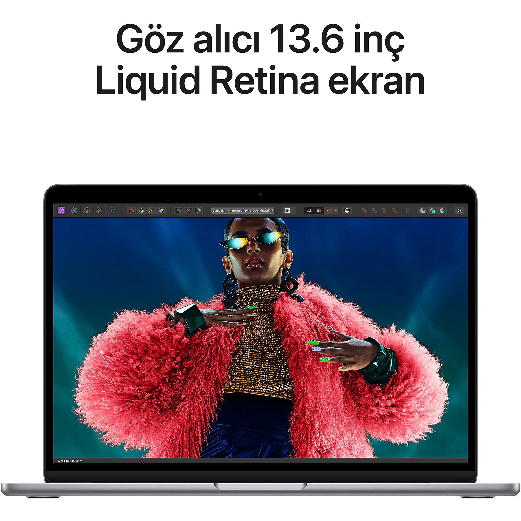 Pembe bir ceket giyen ve güneş gözlüğü takan bir kadının olduğu bir dizüstü bilgisayar.
