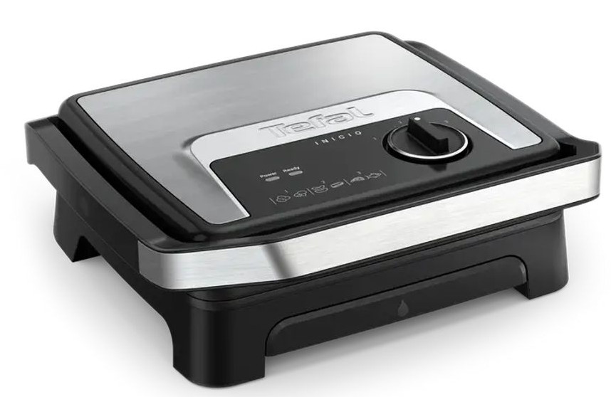 Grill Tefal Inicio z czarną podstawą i srebrną górą na białym tle.