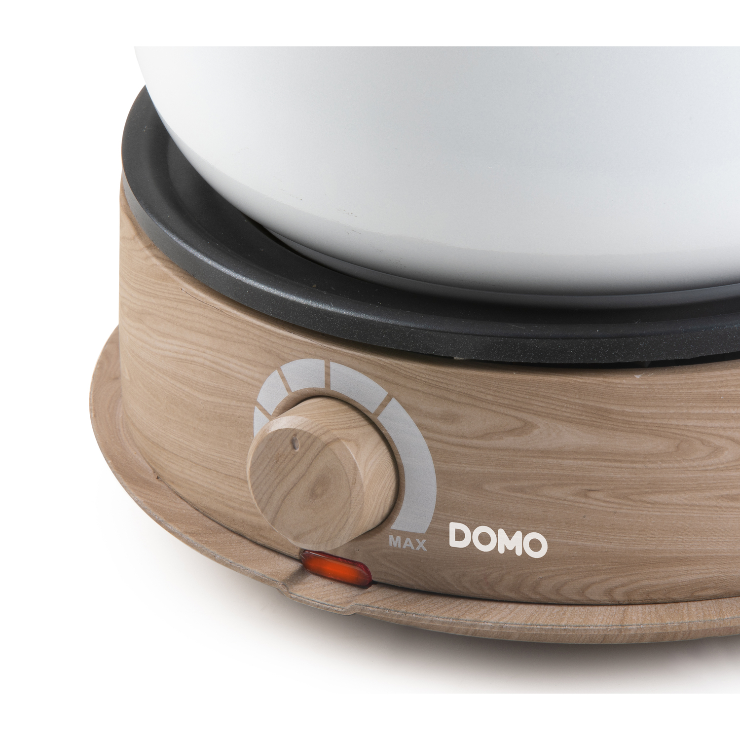 A close-up of a kitchen appliance with a wooden texture, a dial, and a light, on a white background.