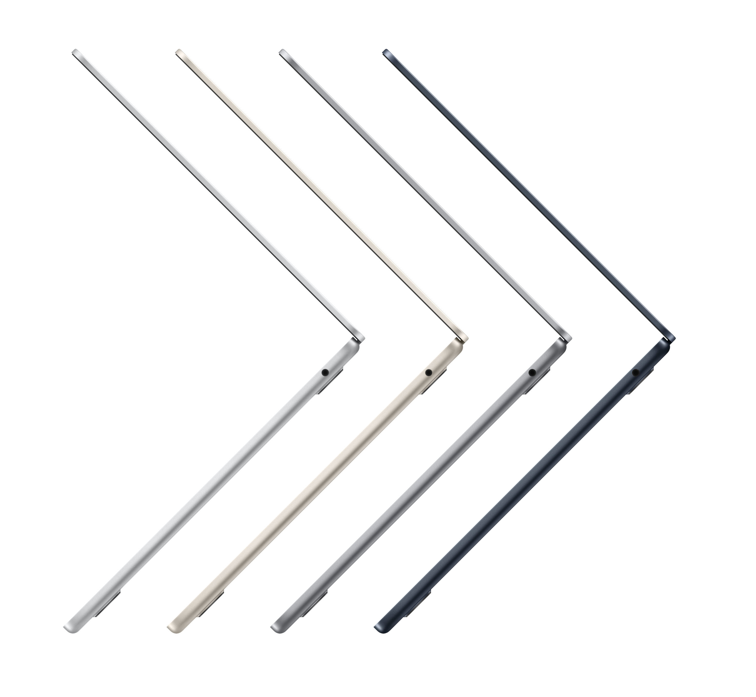 Cztery laptopy w różnych kolorach, ustawione na białej powierzchni.