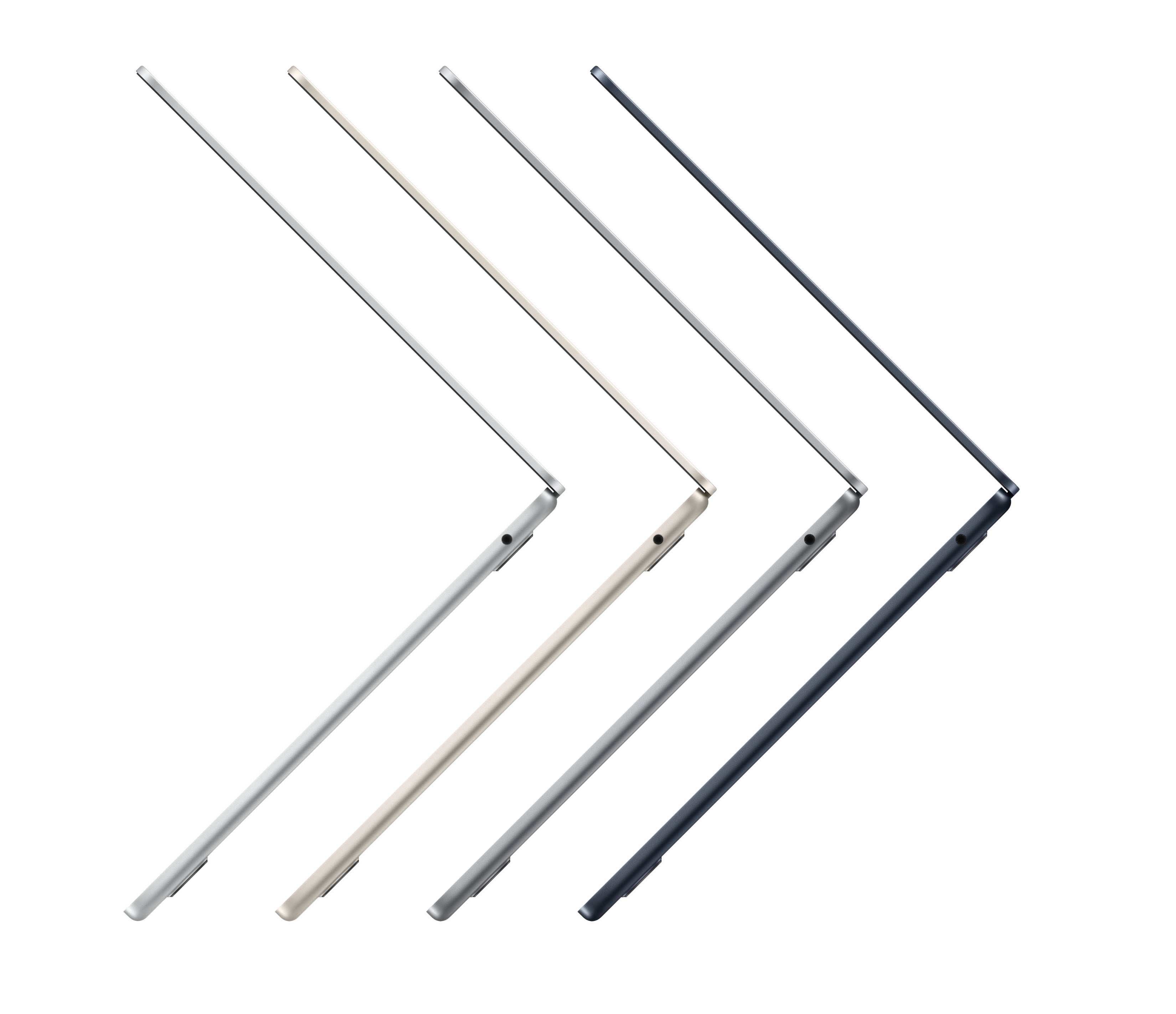 Cztery laptopy w różnych kolorach, białe tło. Laptopy są pod kątem, pokazując profil.