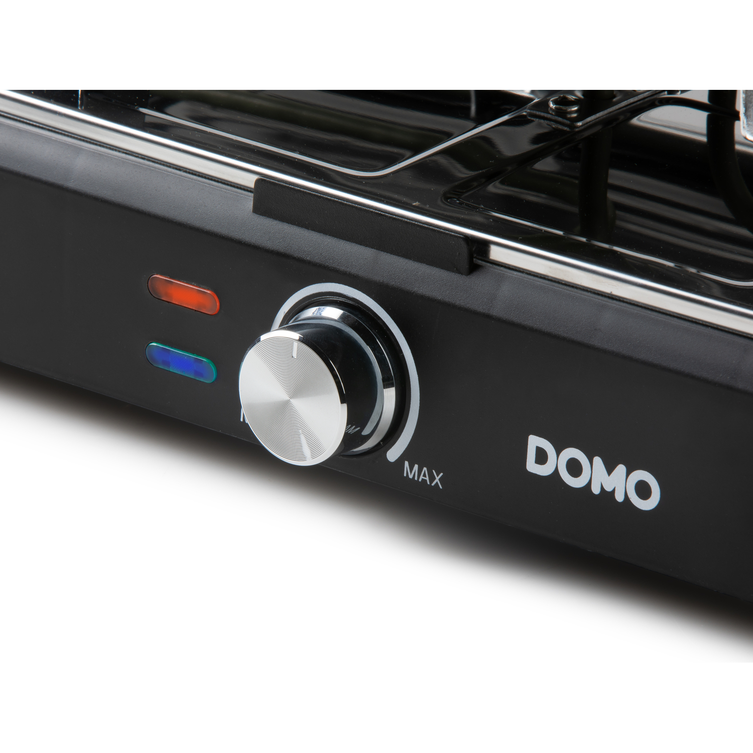 Gros plan sur un grill DOMO noir avec un cadran et des voyants. Max est indiqué.