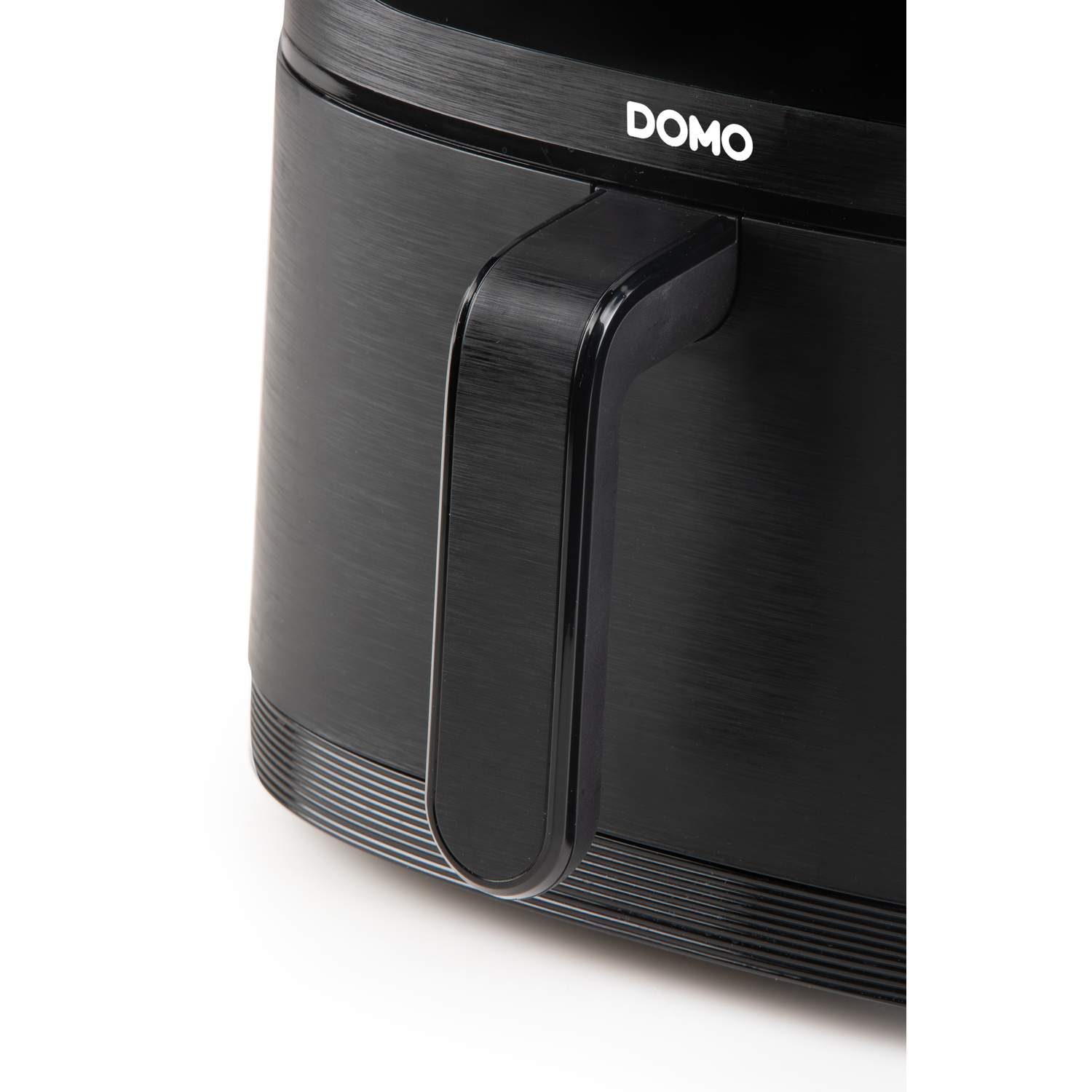 A black air fryer with a handle. It is shown on a white background.