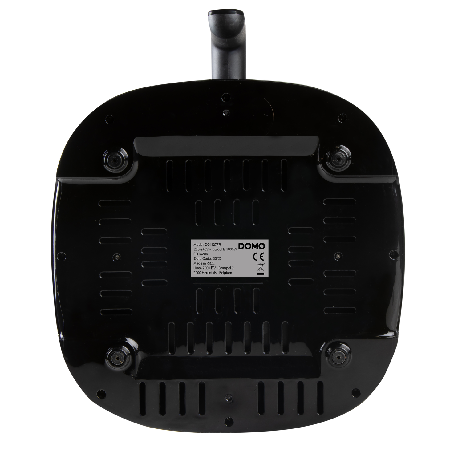 Bottom of a black appliance with vents and a label that says DOMO.